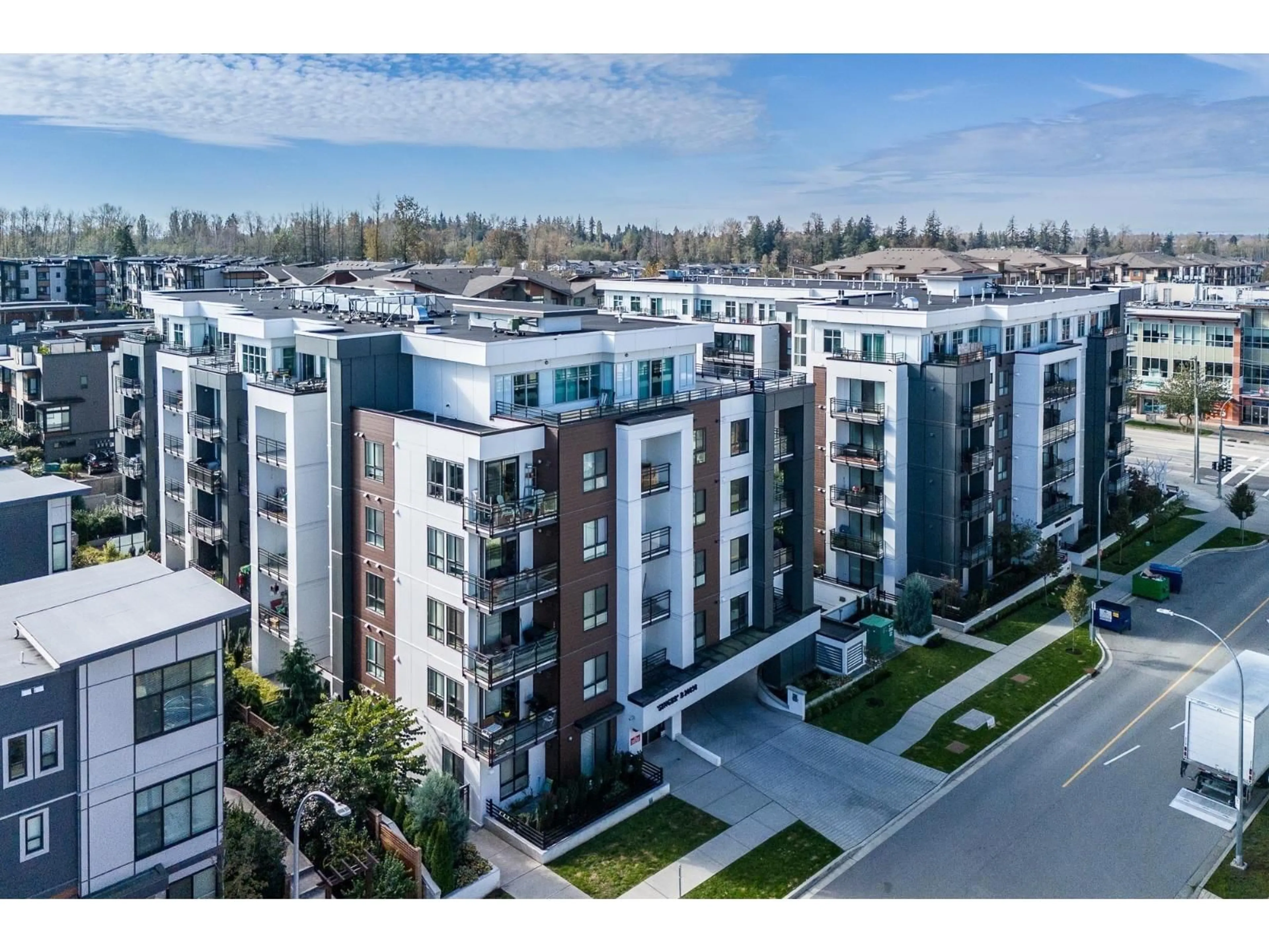 A pic from outside/outdoor area/front of a property/back of a property/a pic from drone, unknown for B302 - 20838 78B, Langley British Columbia V2Y3M2