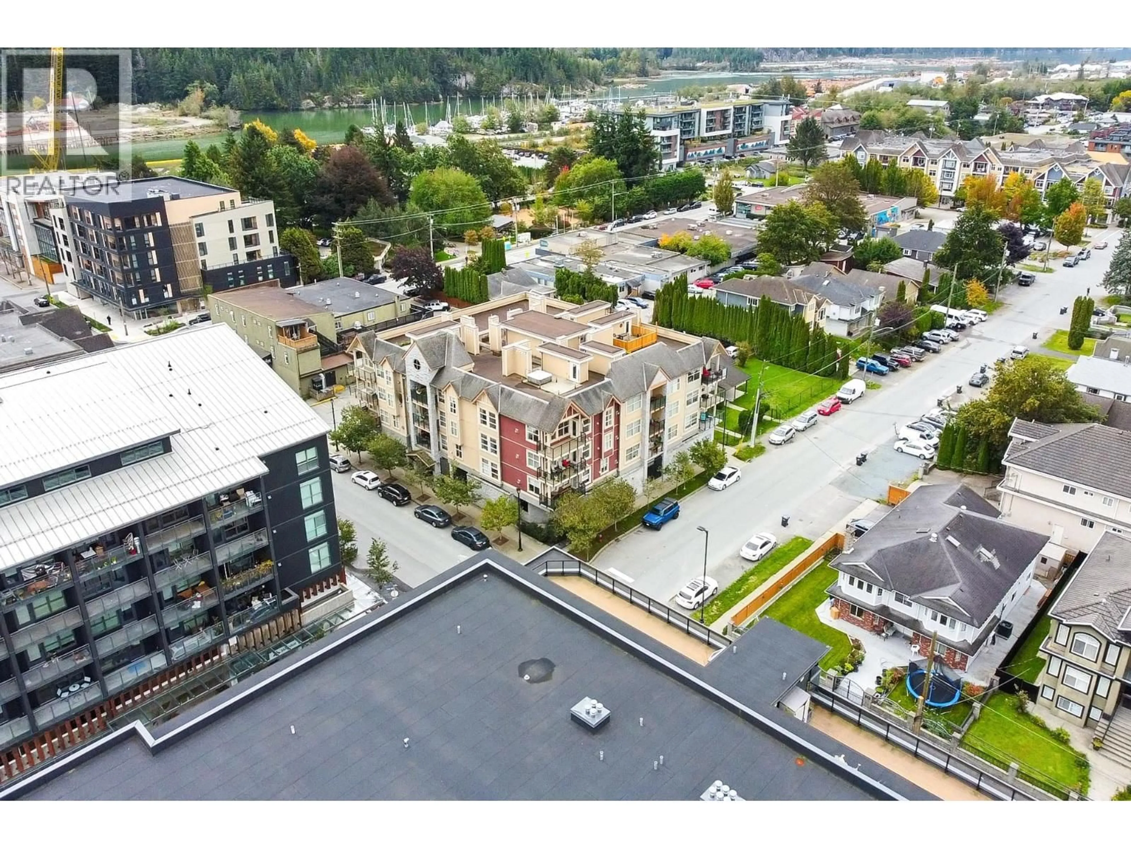 A pic from outside/outdoor area/front of a property/back of a property/a pic from drone, city buildings view from balcony for 403 - 1310 VICTORIA STREET, Squamish British Columbia V0N3G0