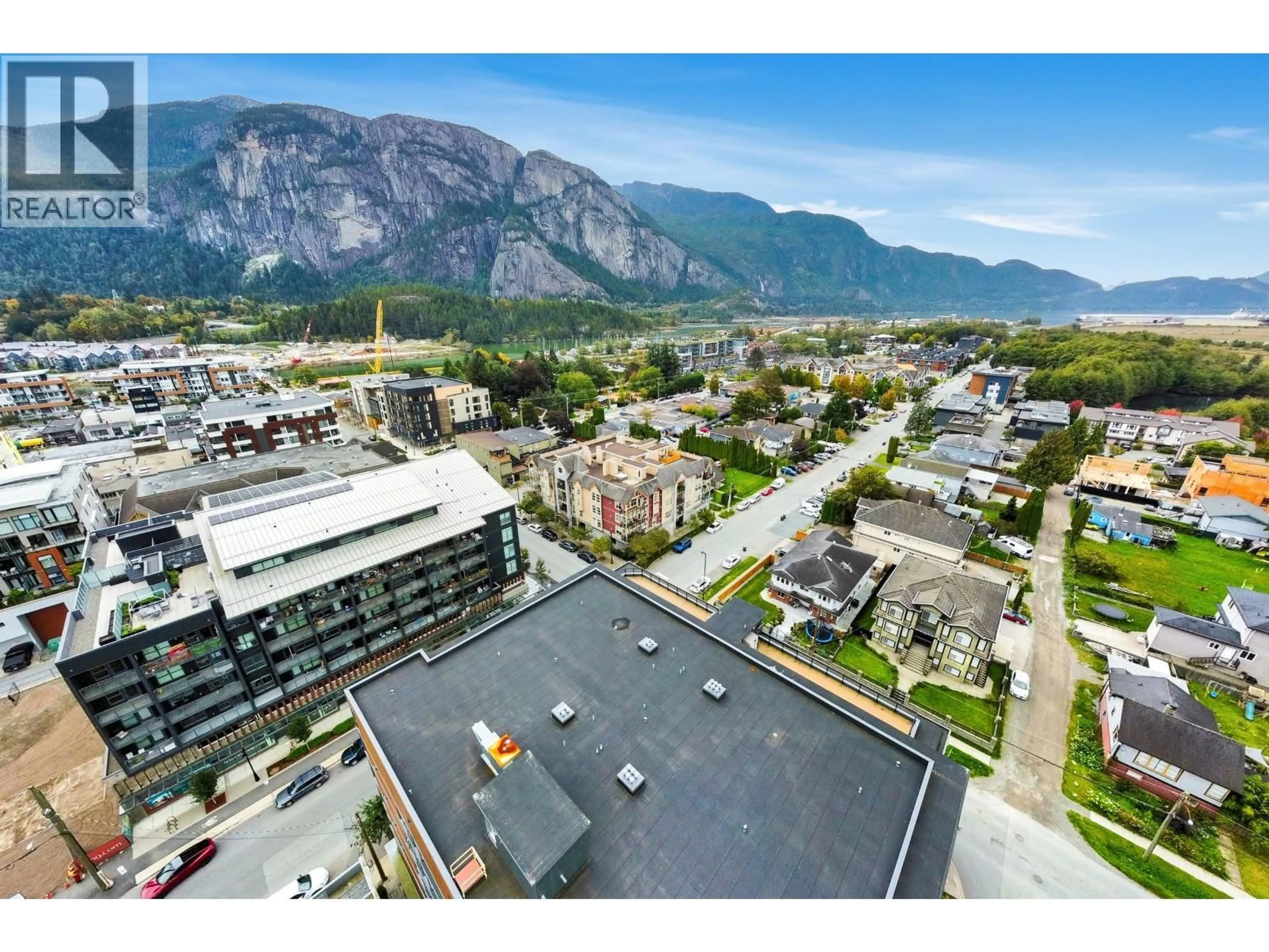 A pic from outside/outdoor area/front of a property/back of a property/a pic from drone, mountain view for 403 - 1310 VICTORIA STREET, Squamish British Columbia V0N3G0