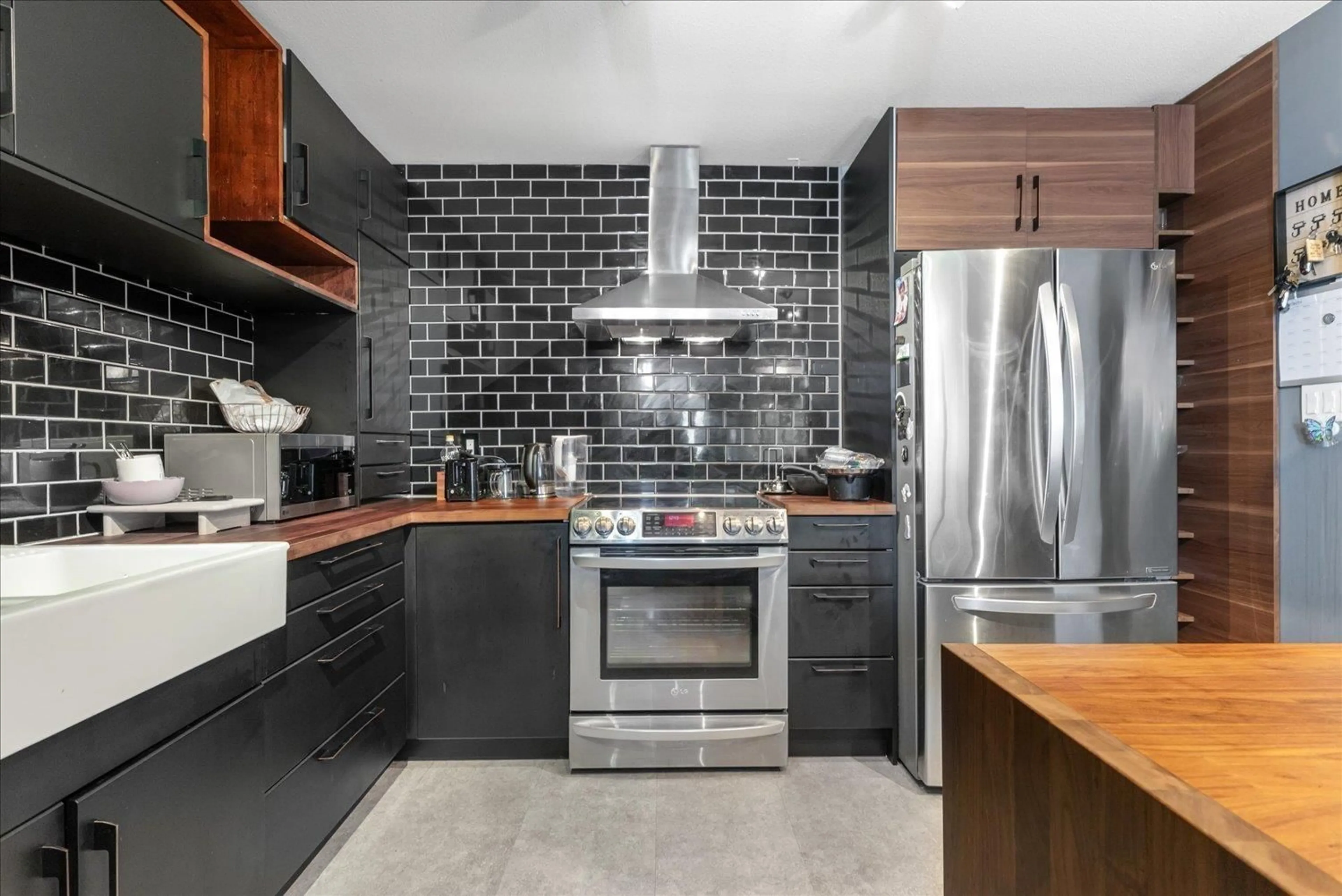 Contemporary kitchen, ceramic/tile floor for 203 - 2575 WARE, Abbotsford British Columbia V2S3E2