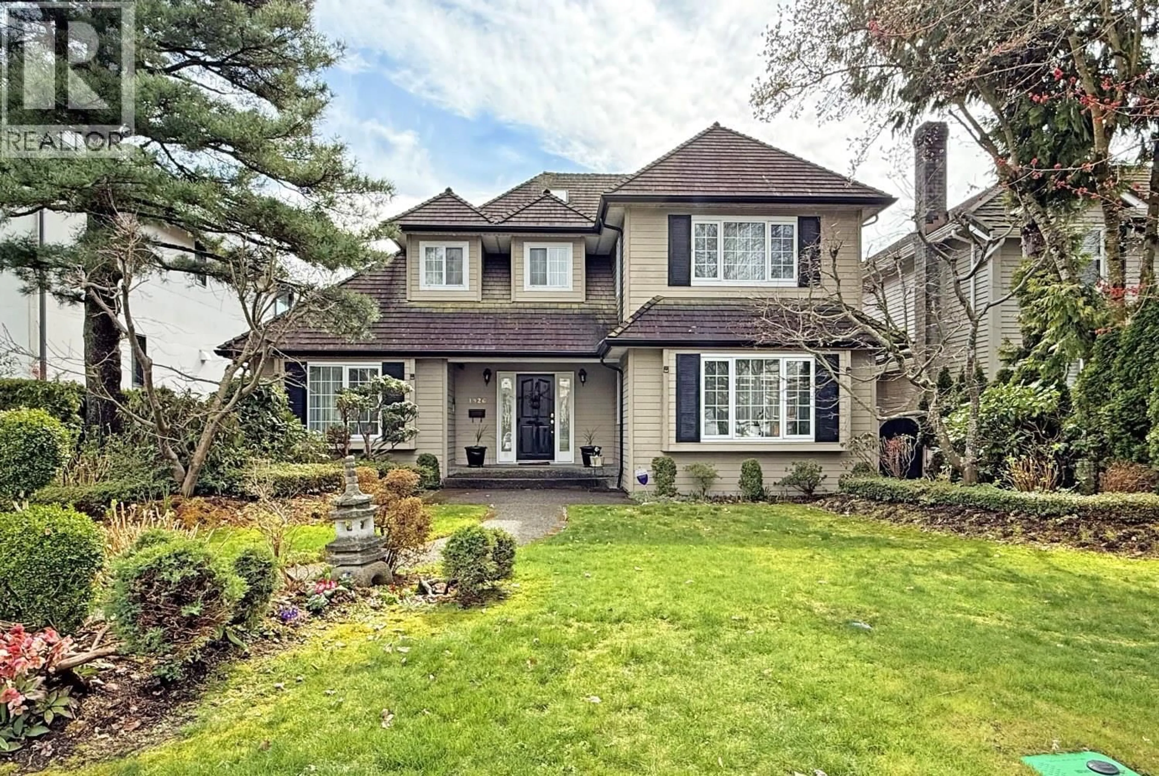 Home with brick exterior material, street for 1926 62ND AVENUE, Vancouver British Columbia V6P2G6