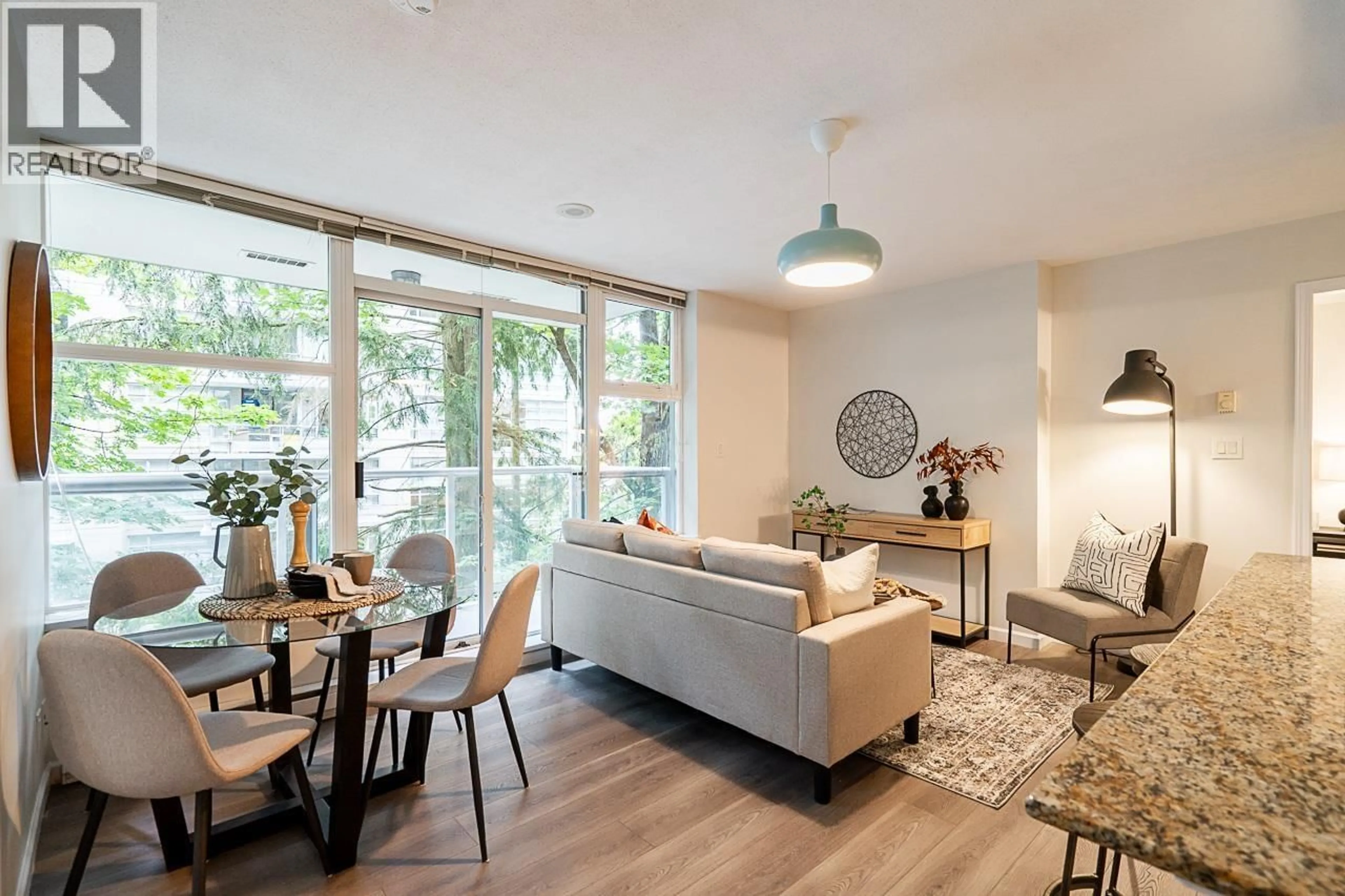 Living room with furniture, unknown for 311 - 9262 UNIVERSITY CRESCENT, Burnaby British Columbia V5A0A4