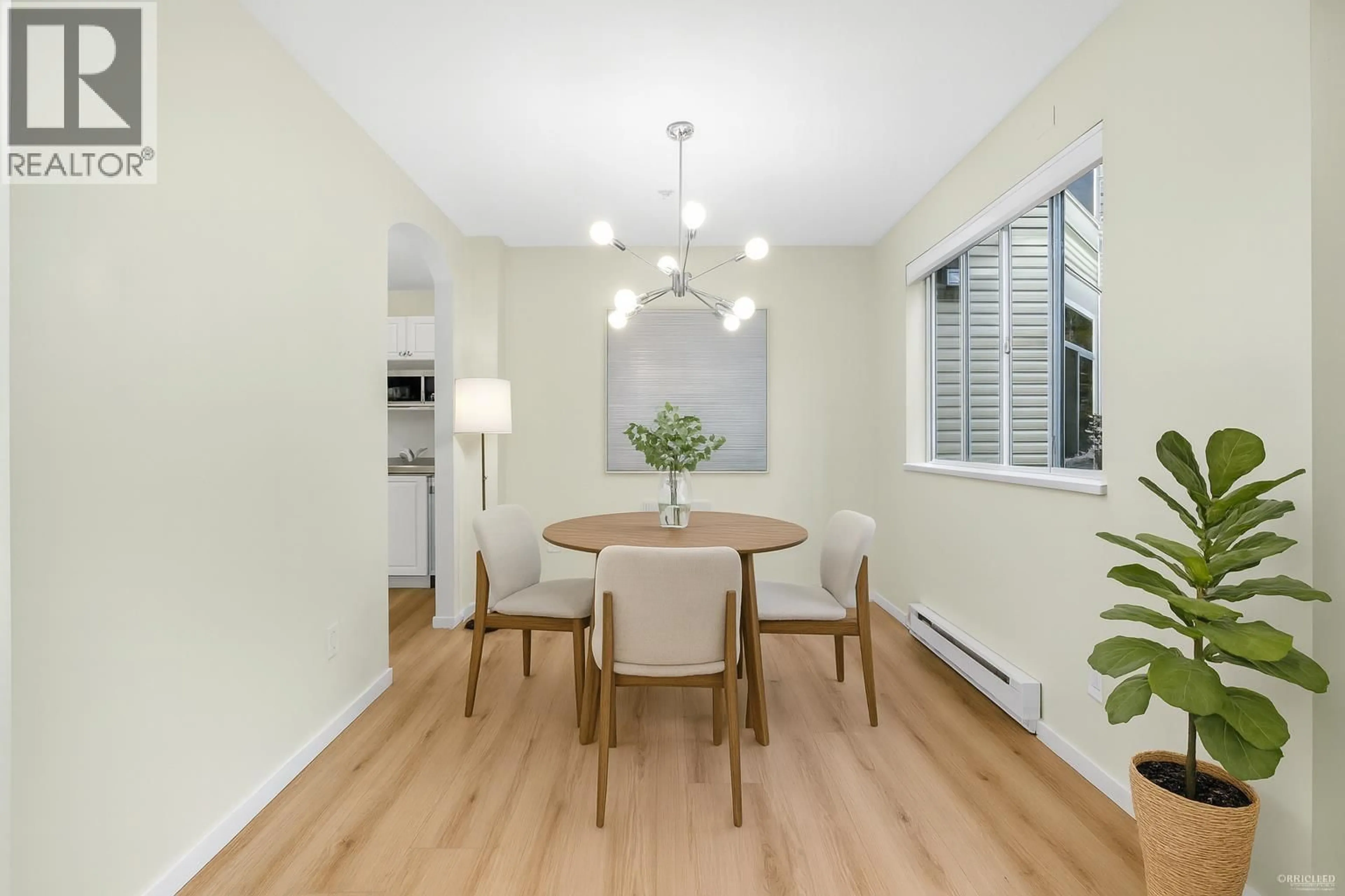 Dining room, wood/laminate floor for 101 - 3638 RAE AVENUE, Vancouver British Columbia V5R2P5
