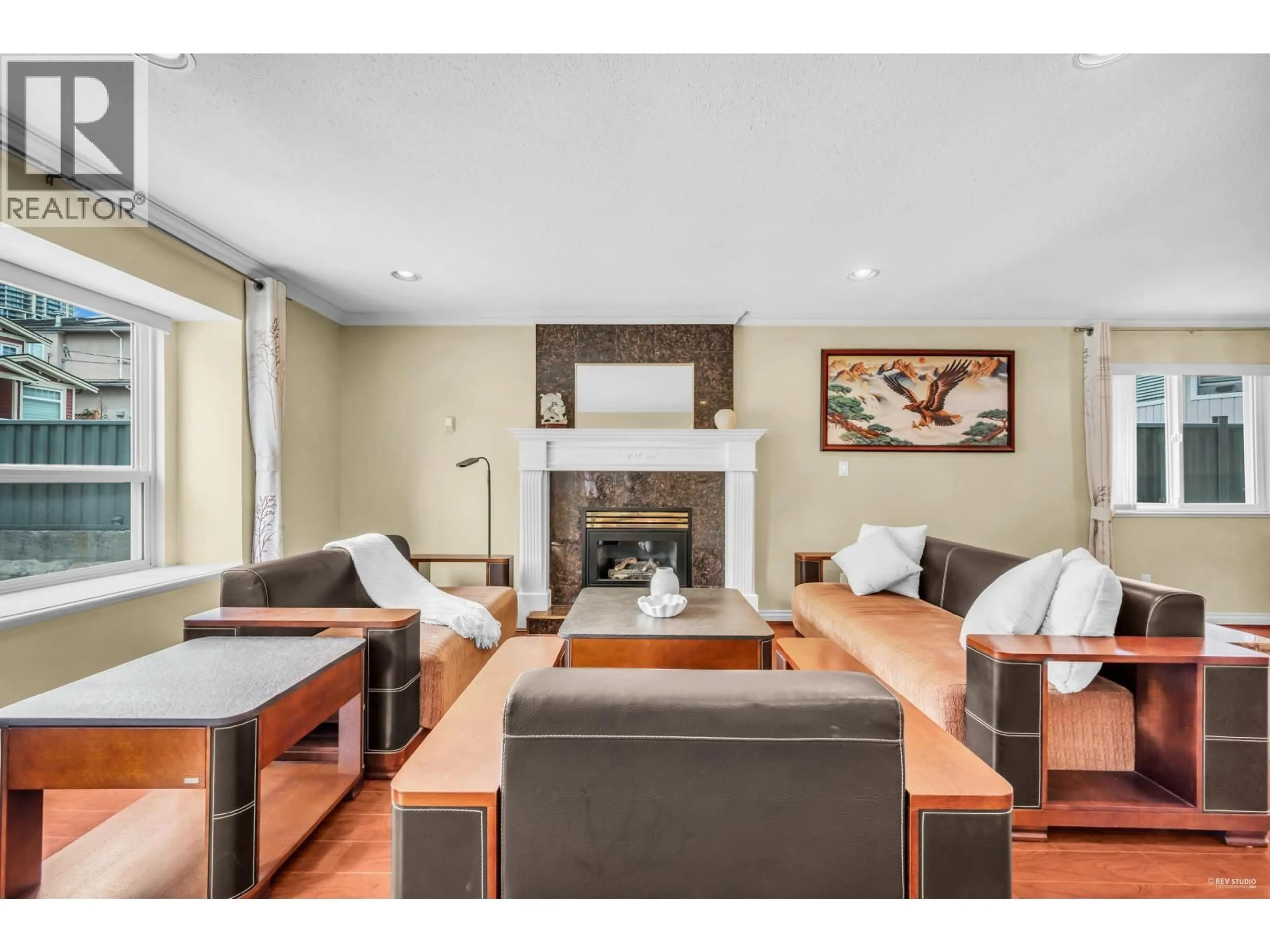 Living room with furniture, wood/laminate floor for 7222 16TH AVENUE, Burnaby British Columbia V3N1N5