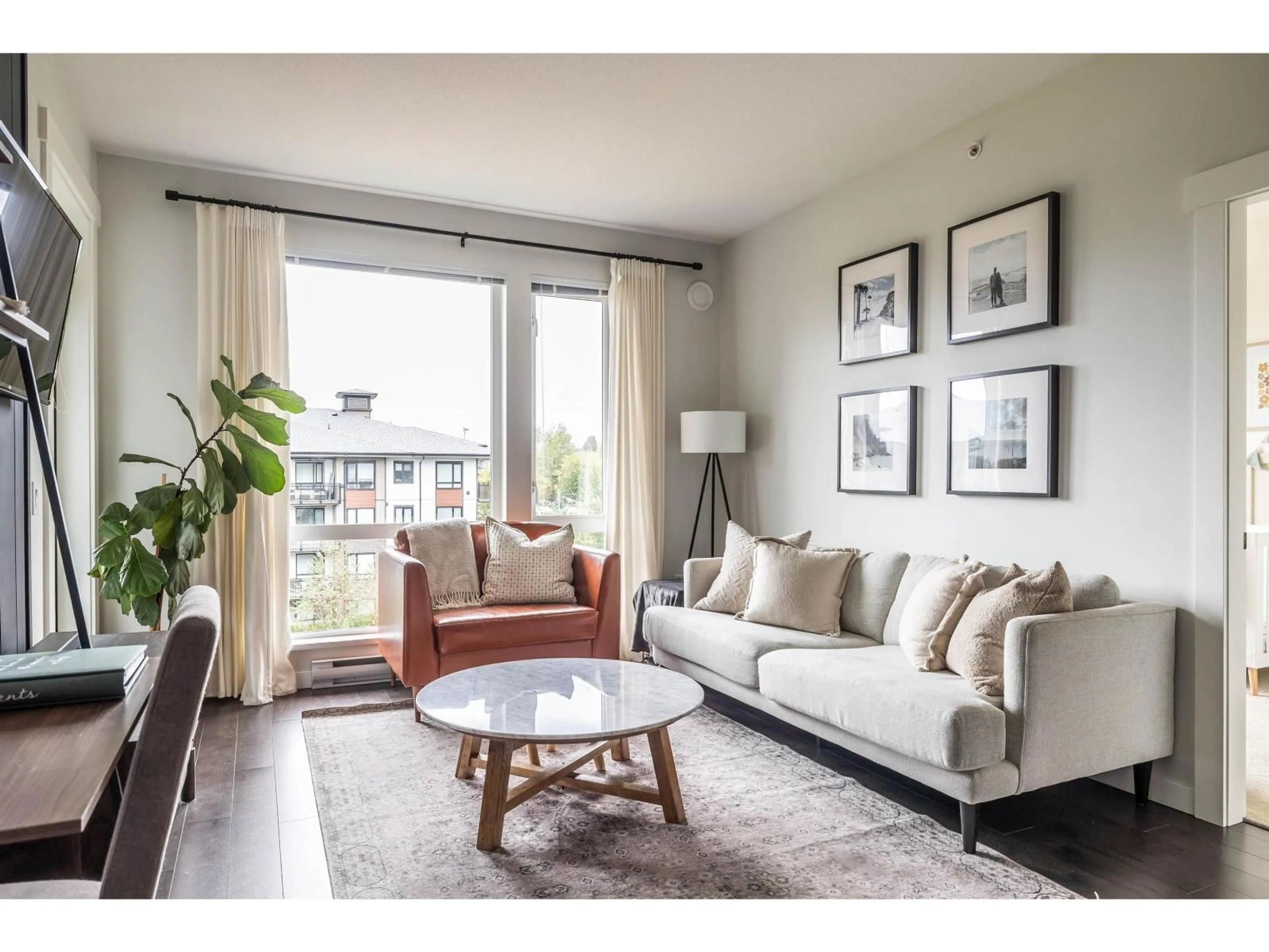 Living room with furniture, wood/laminate floor for 407 - 31158 WESTRIDGE, Abbotsford British Columbia V2T0K5