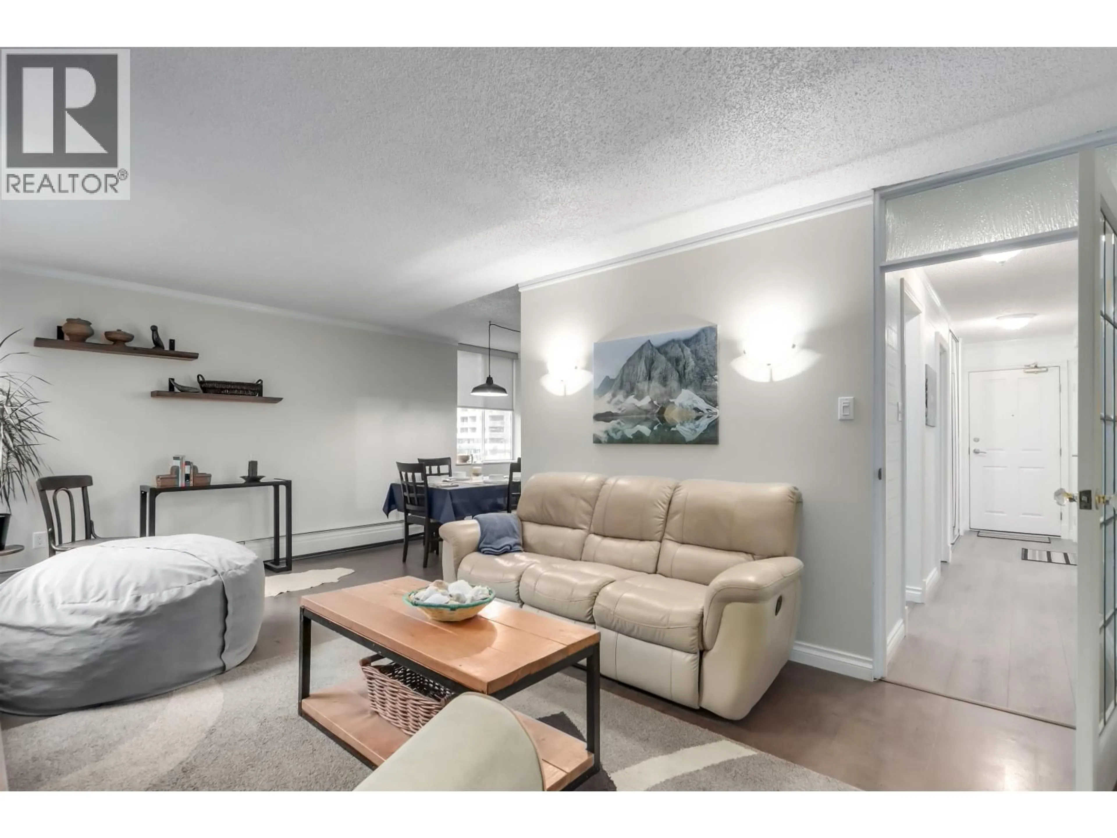 Living room with furniture, wood/laminate floor for 303 - 2004 FULLERTON AVENUE, North Vancouver British Columbia V7P3G8