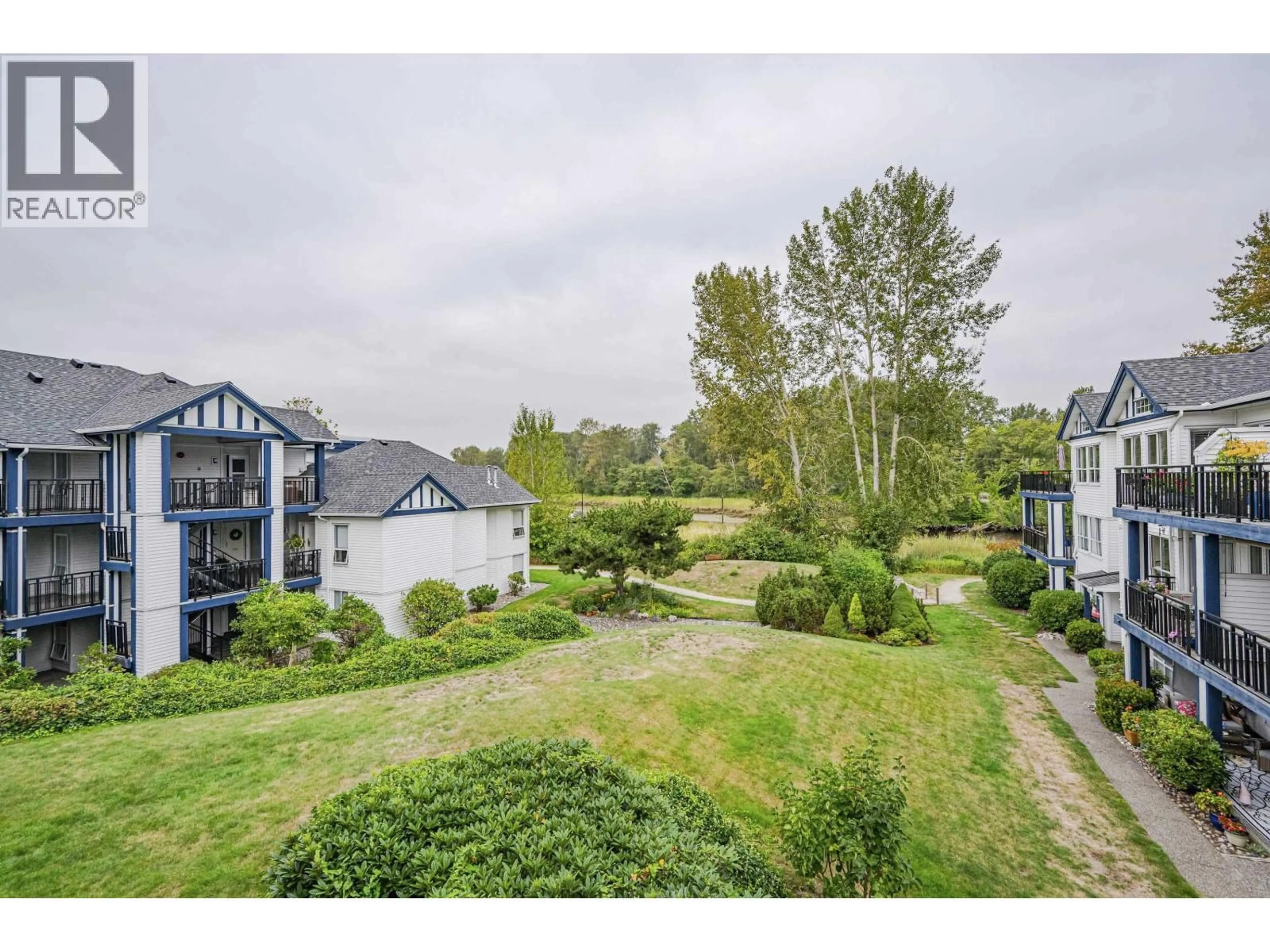 A pic from outside/outdoor area/front of a property/back of a property/a pic from drone, water/lake/river/ocean view for 307 - 4955 RIVER ROAD, Delta British Columbia V4K4V9