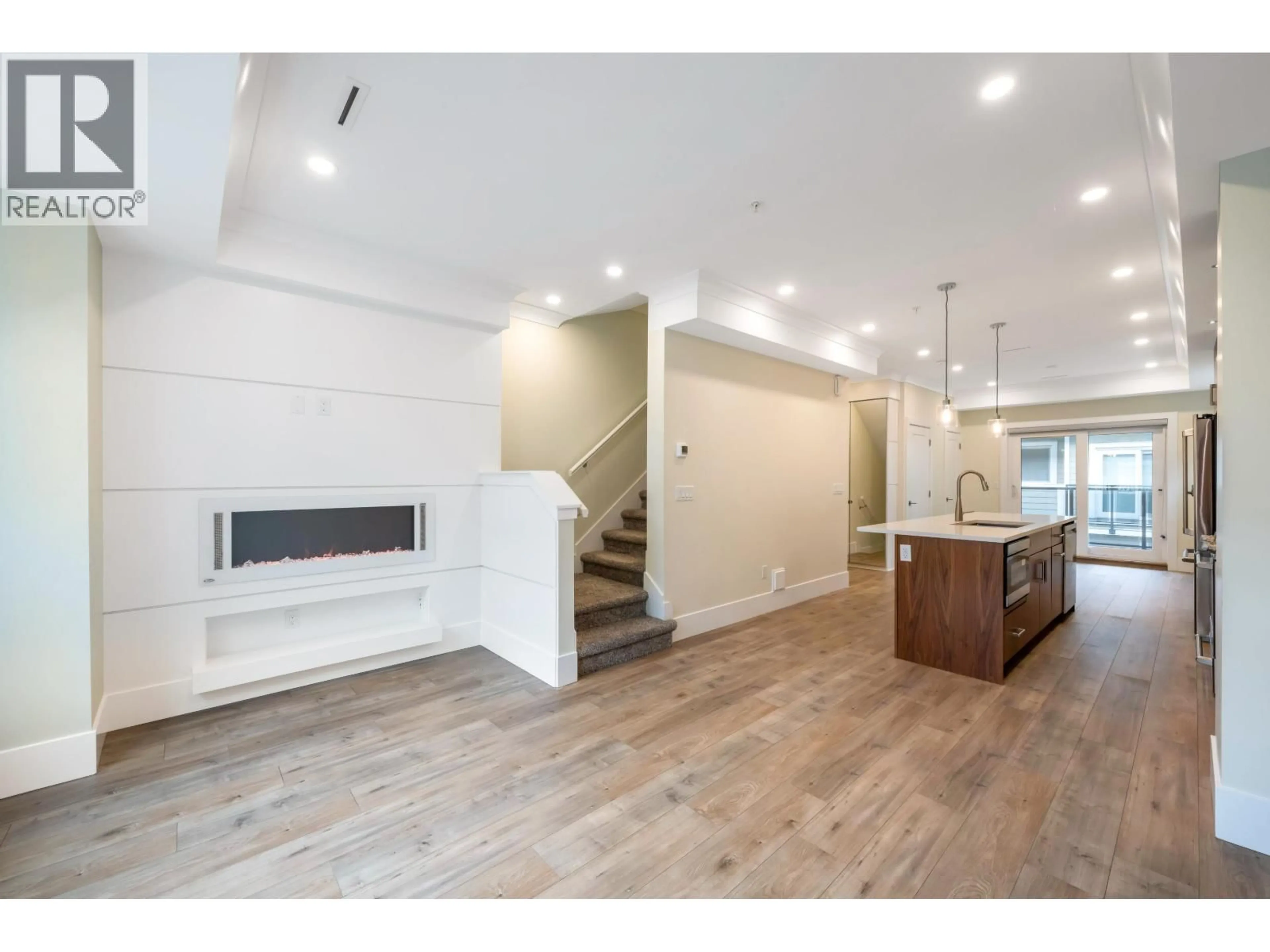 Open concept kitchen, wood/laminate floor for 4908 ELLIS LANE, Delta British Columbia V4K0E1