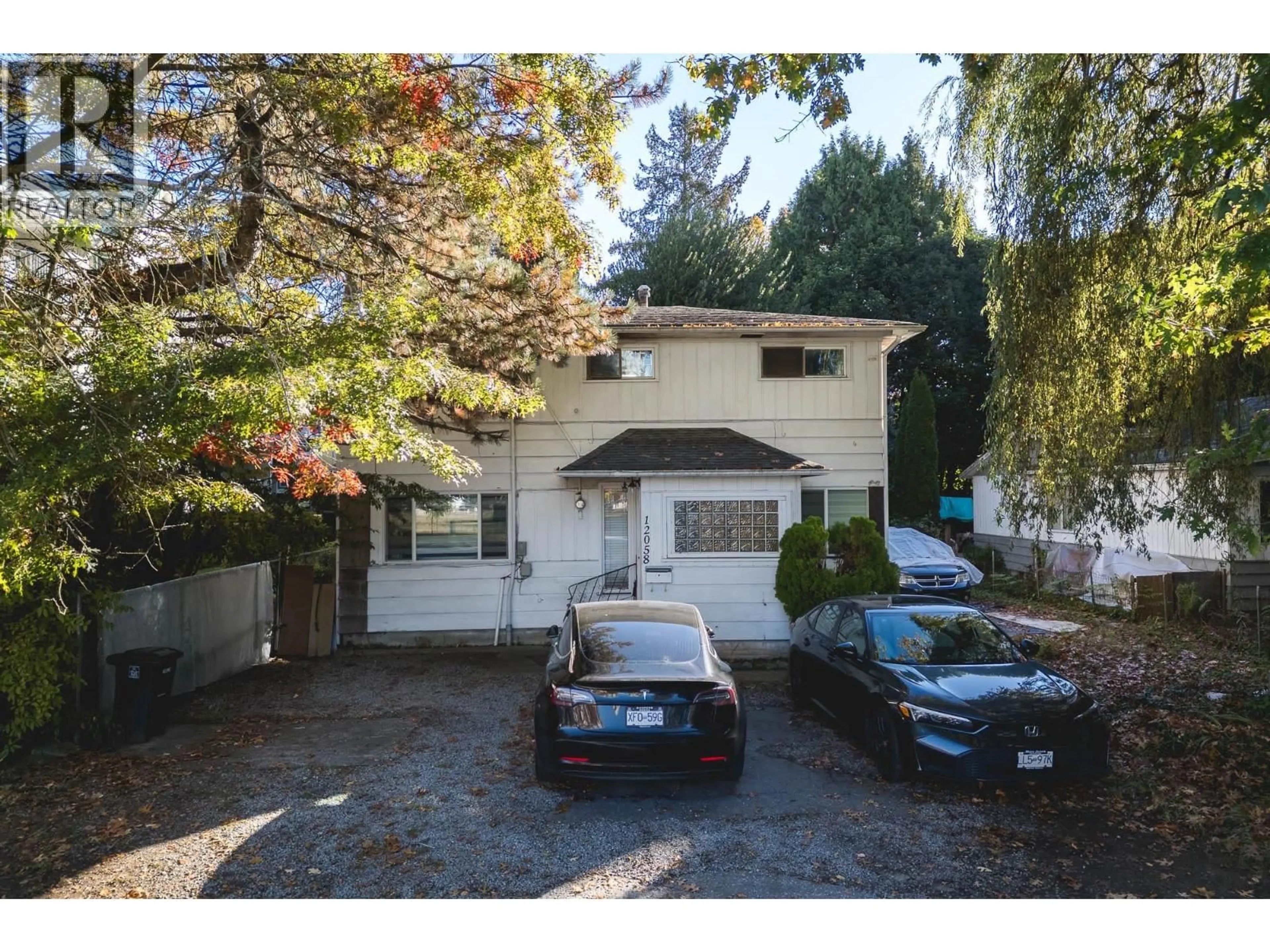 A pic from outside/outdoor area/front of a property/back of a property/a pic from drone, street for 12058 HARRIS ROAD, Pitt Meadows British Columbia V3Y2B5