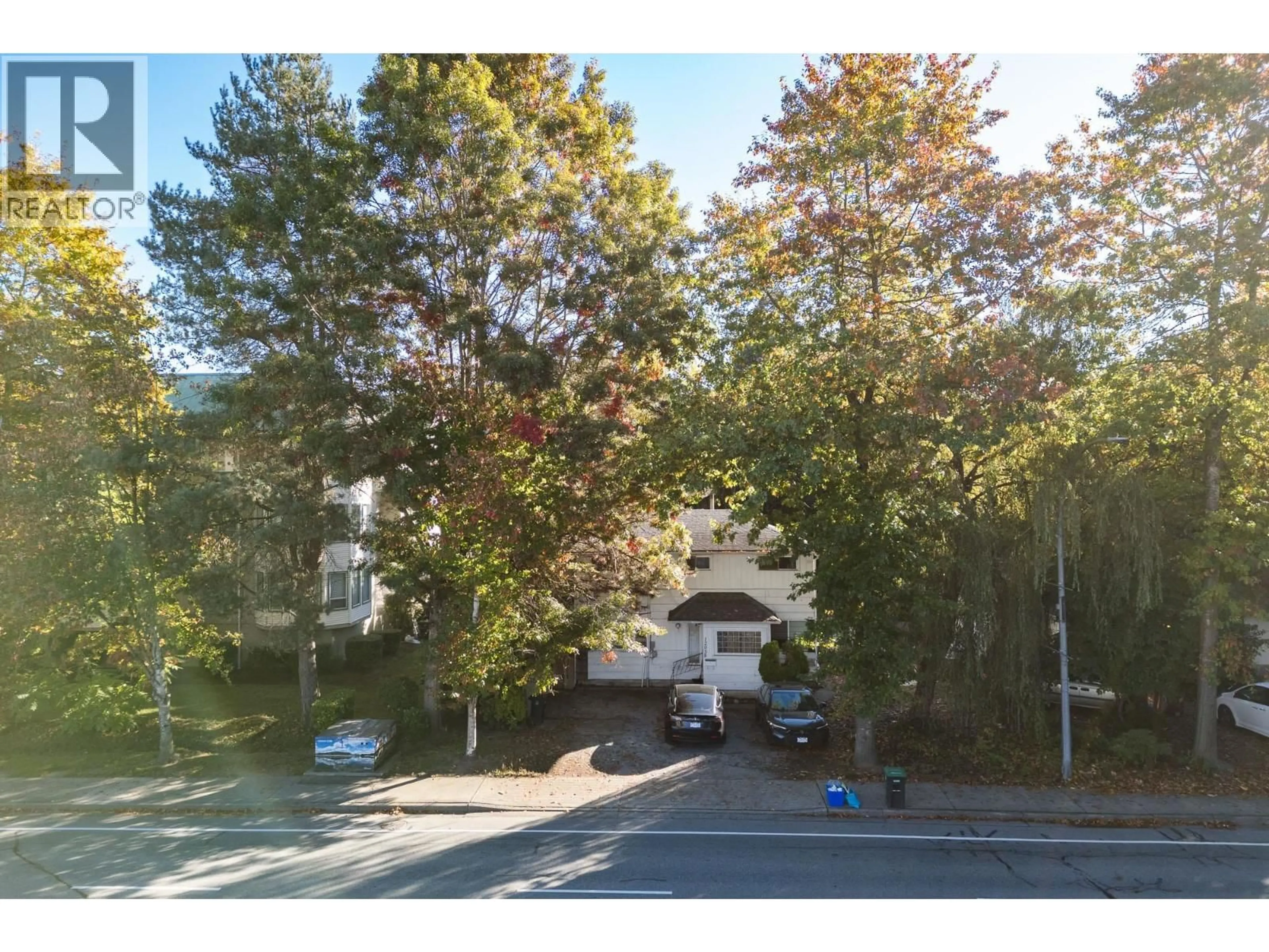 A pic from outside/outdoor area/front of a property/back of a property/a pic from drone, street for 12058 HARRIS ROAD, Pitt Meadows British Columbia V3Y2B5