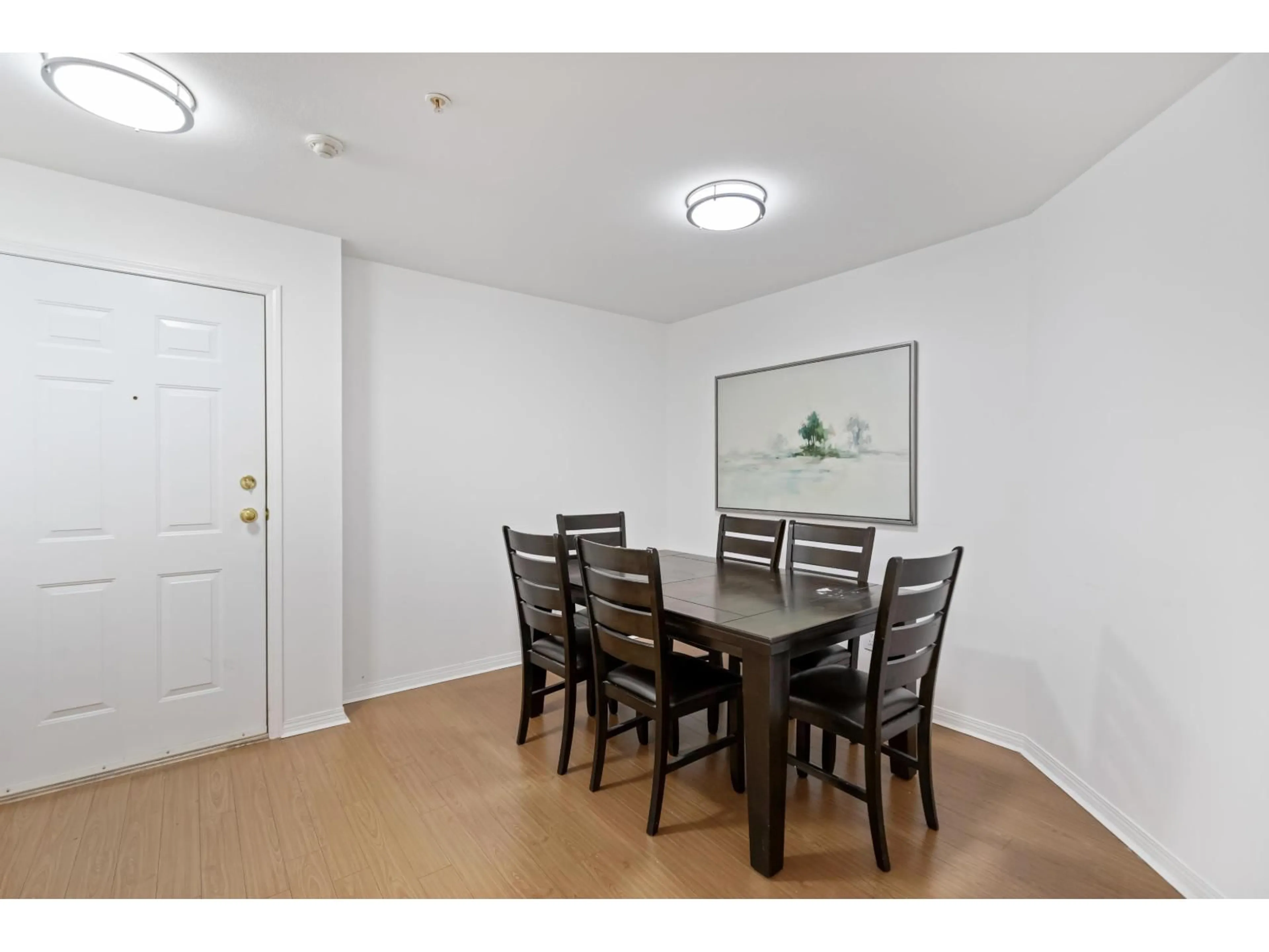 Dining room, wood/laminate floor for 404 - 12125 75A, Surrey British Columbia V3W1B9