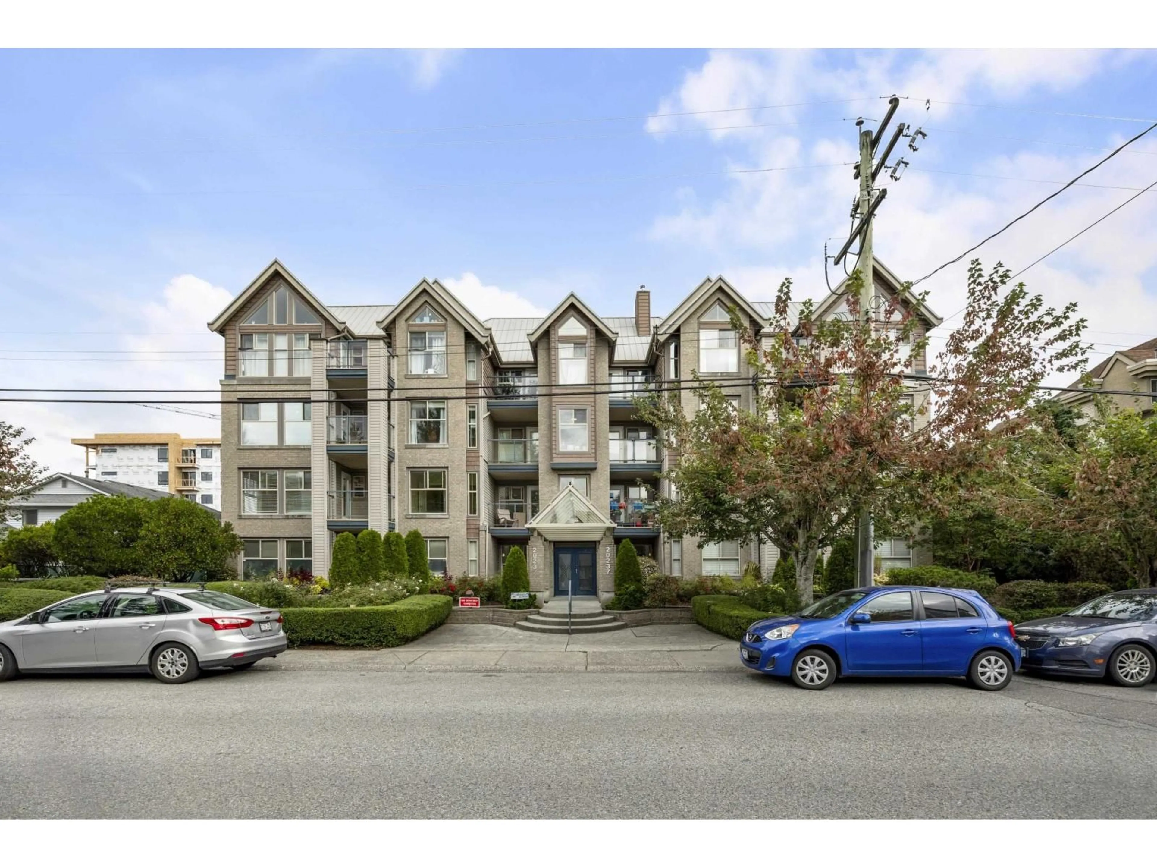 A pic from outside/outdoor area/front of a property/back of a property/a pic from drone, unknown for 302 - 20237 54, Langley British Columbia V3A3W2
