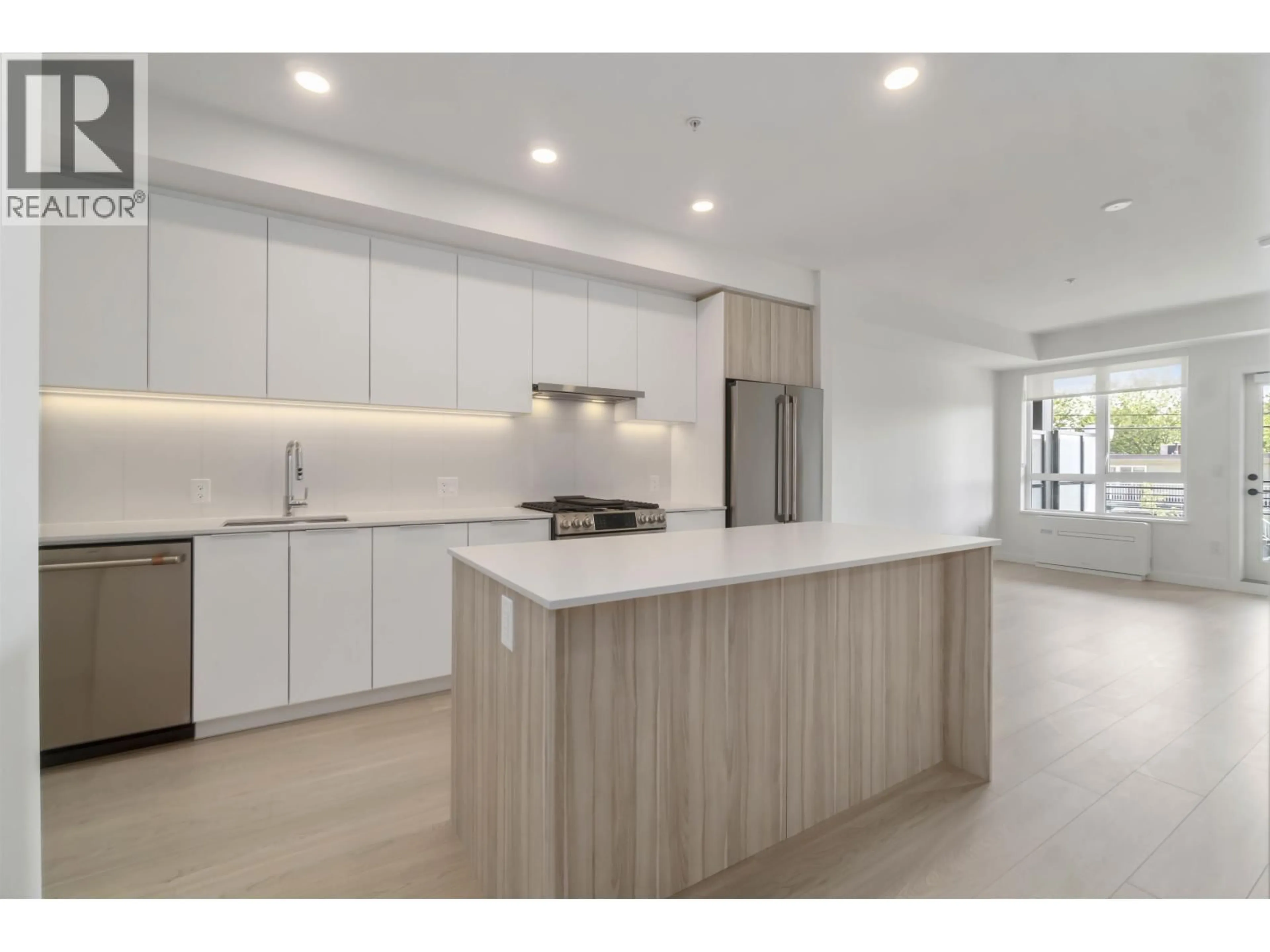 Open concept kitchen, unknown for 212 - 2450 GARDEN DRIVE, Vancouver British Columbia V5N0K1