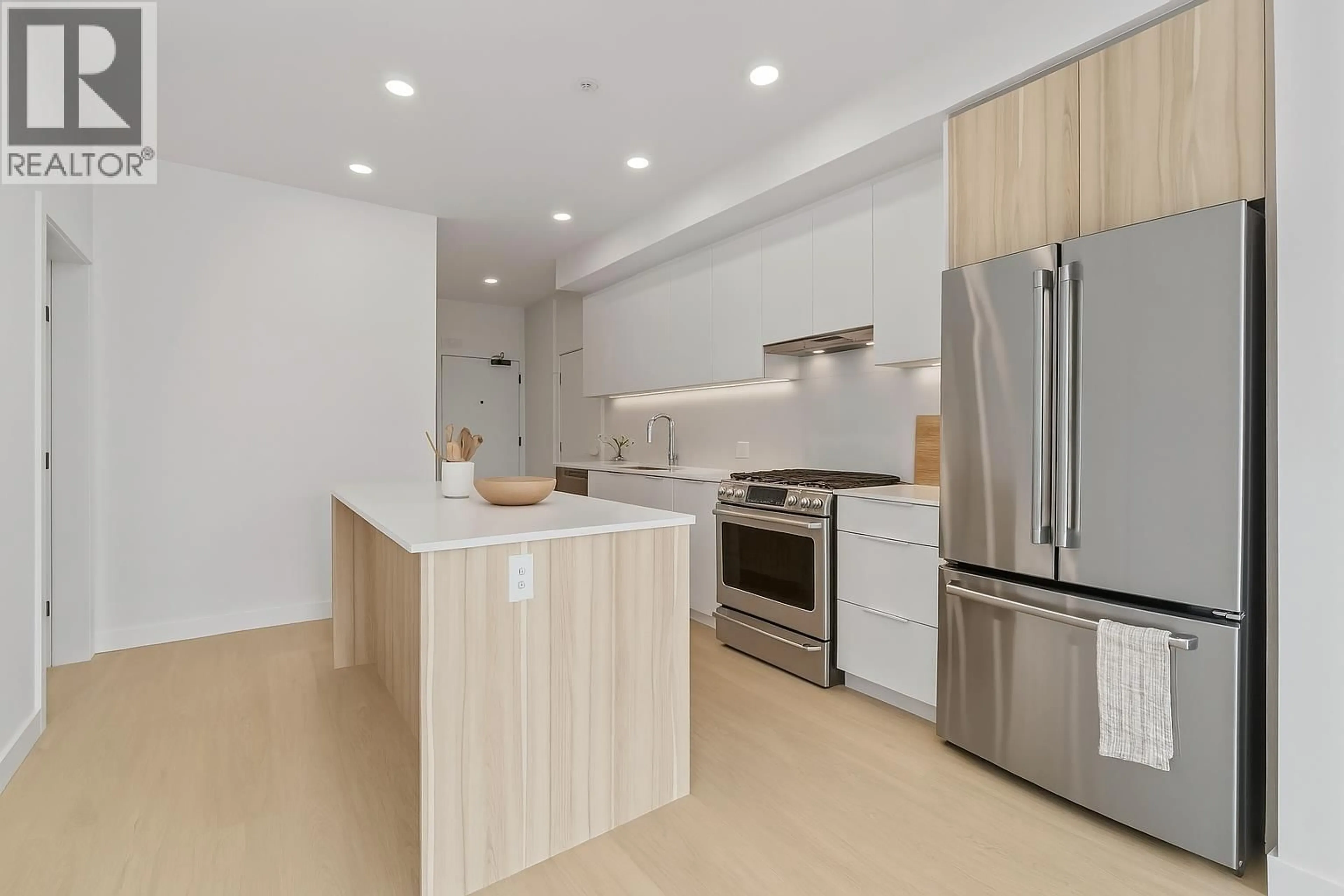 Open concept kitchen, unknown for 212 - 2450 GARDEN DRIVE, Vancouver British Columbia V5N0K1