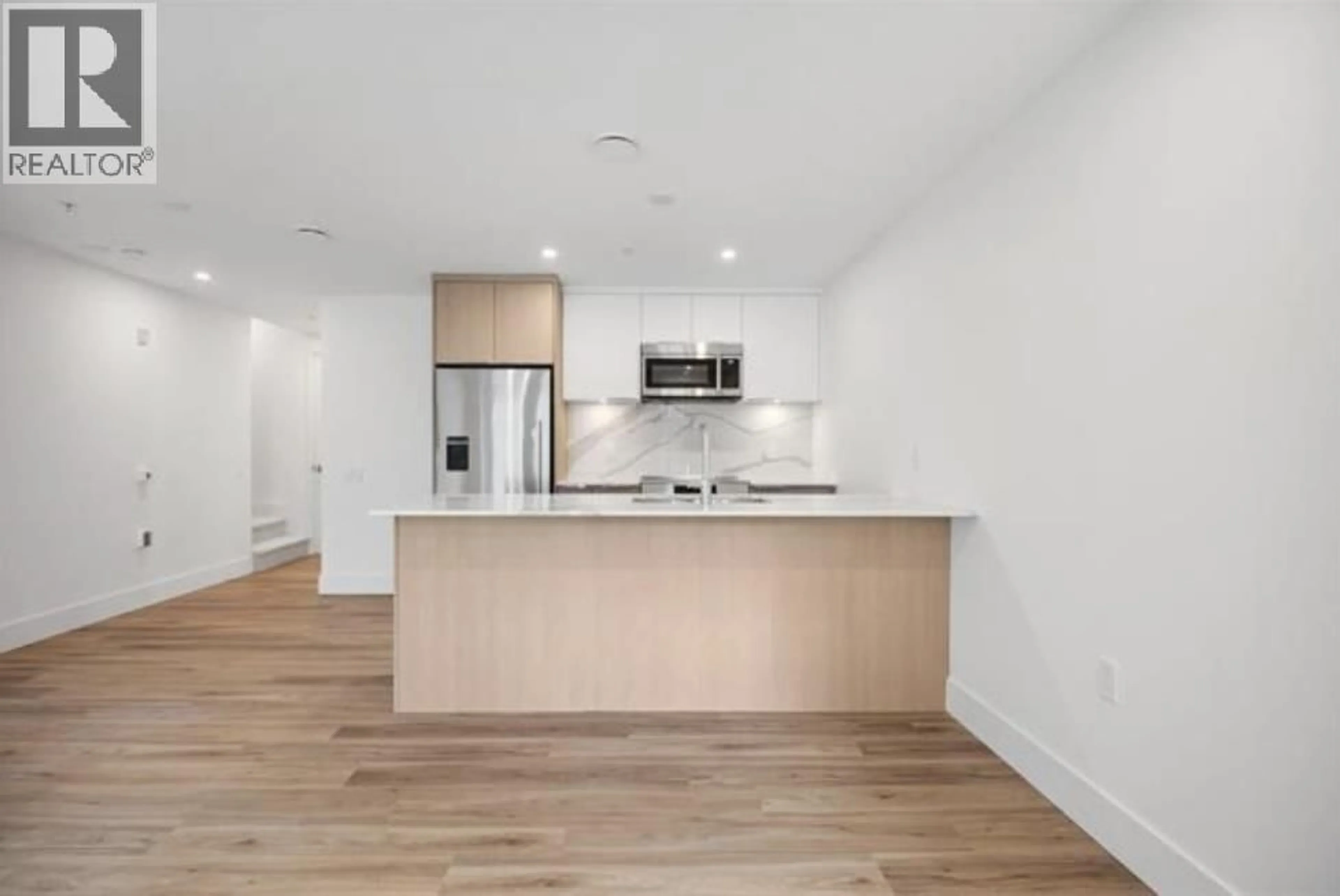 Open concept kitchen, unknown for 110 - 2085 1ST AVENUE, Vancouver British Columbia V5N1B6