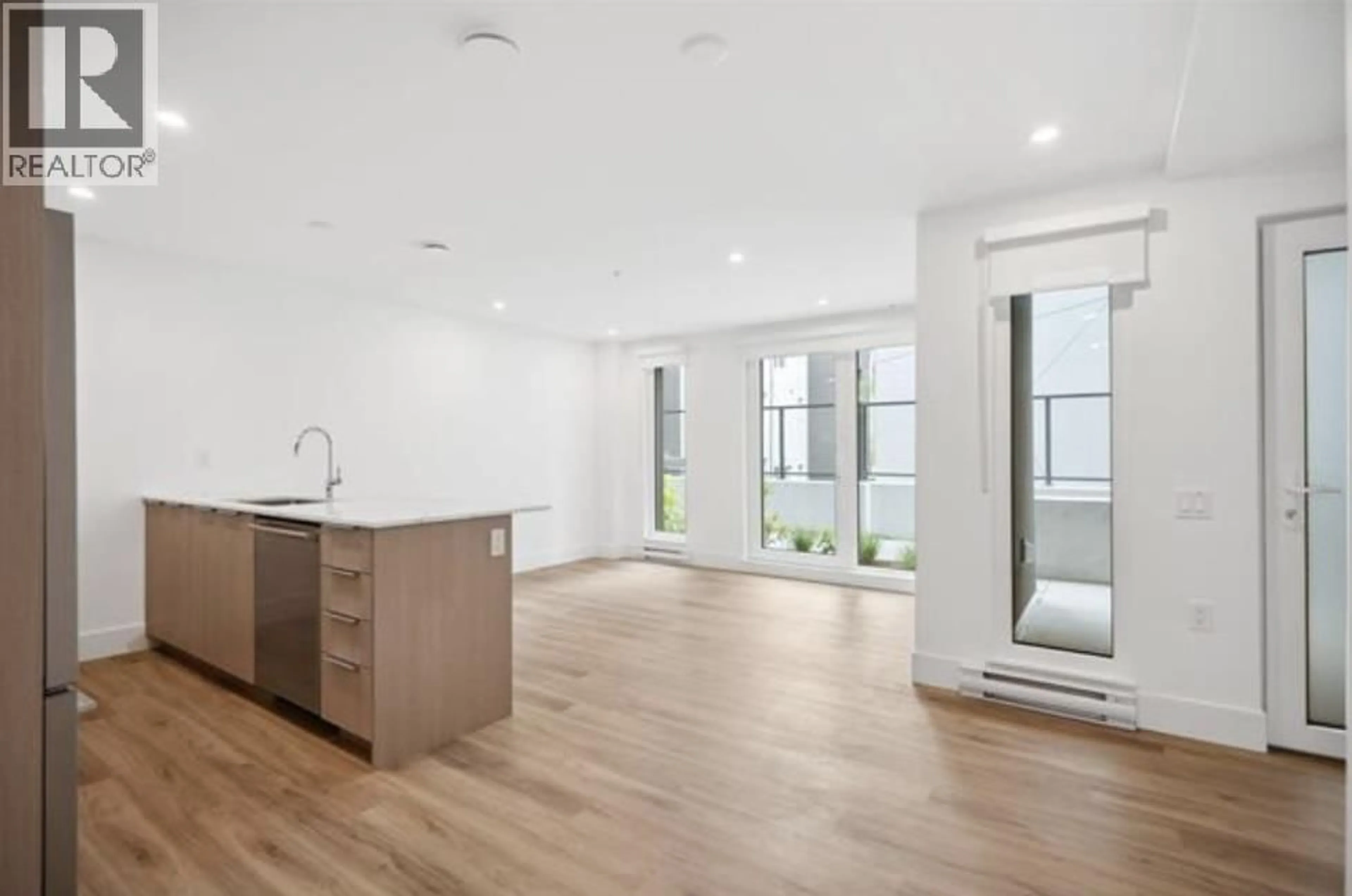 Open concept kitchen, unknown for 110 - 2085 1ST AVENUE, Vancouver British Columbia V5N1B6