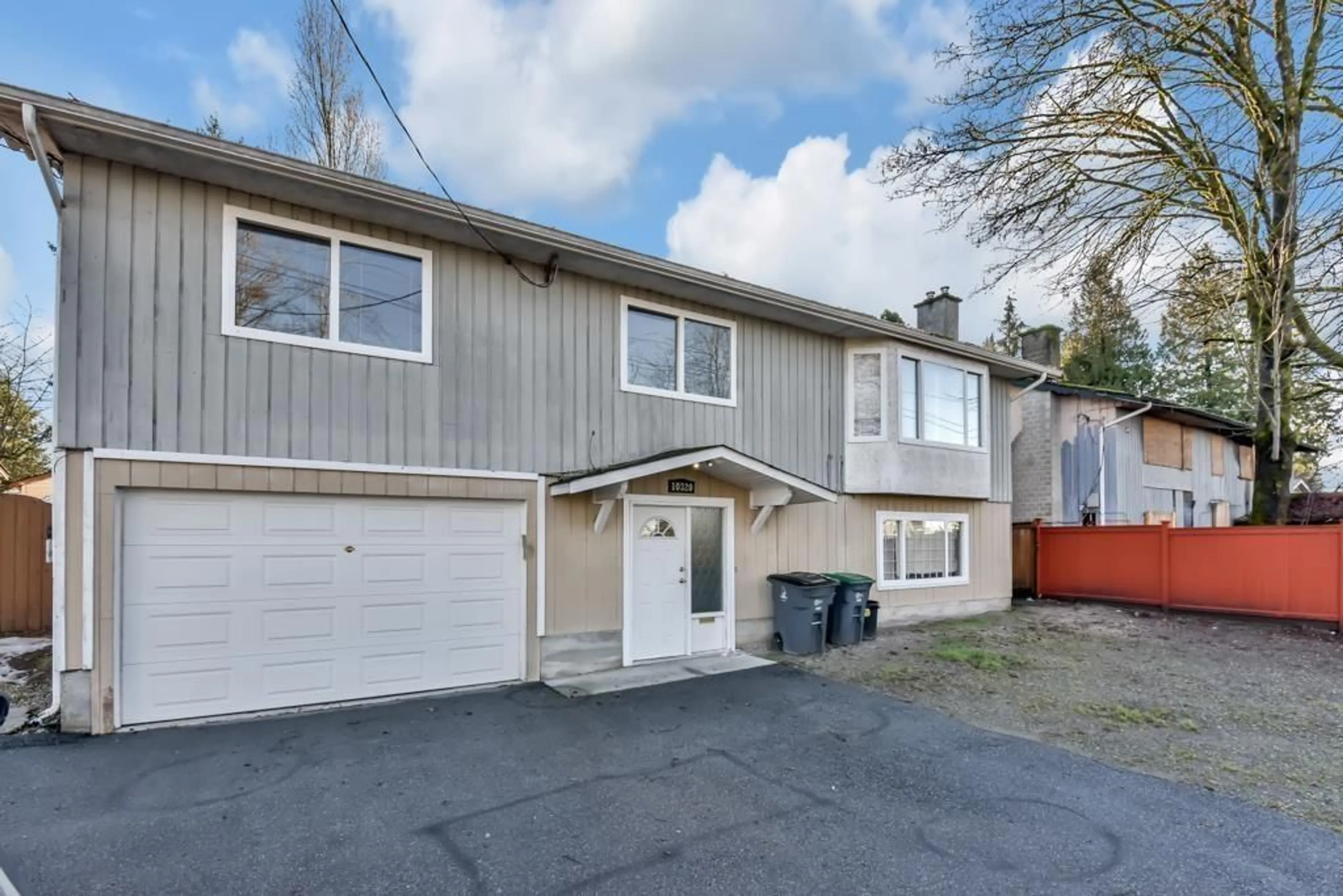 Home with vinyl exterior material, street for 10320 140, Surrey British Columbia V3T4X9