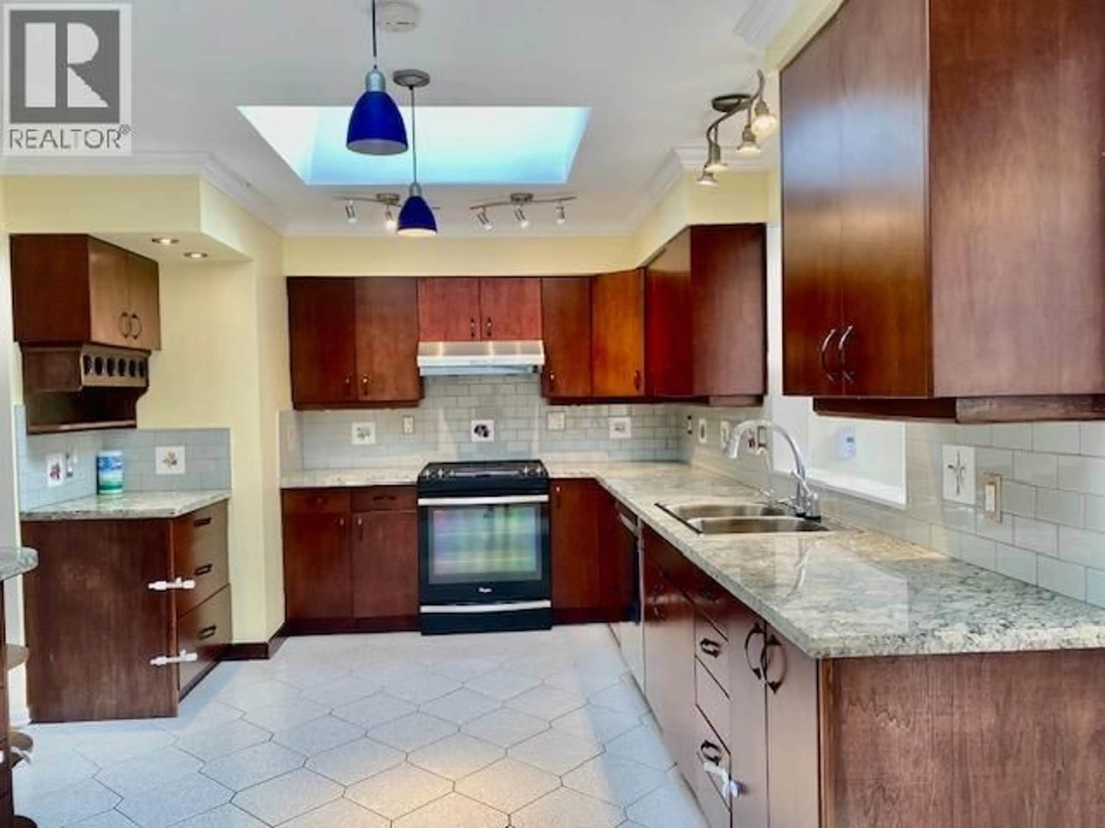 Open concept kitchen, ceramic/tile floor for 1036 COMO LAKE AVENUE, Coquitlam British Columbia V3J3N6