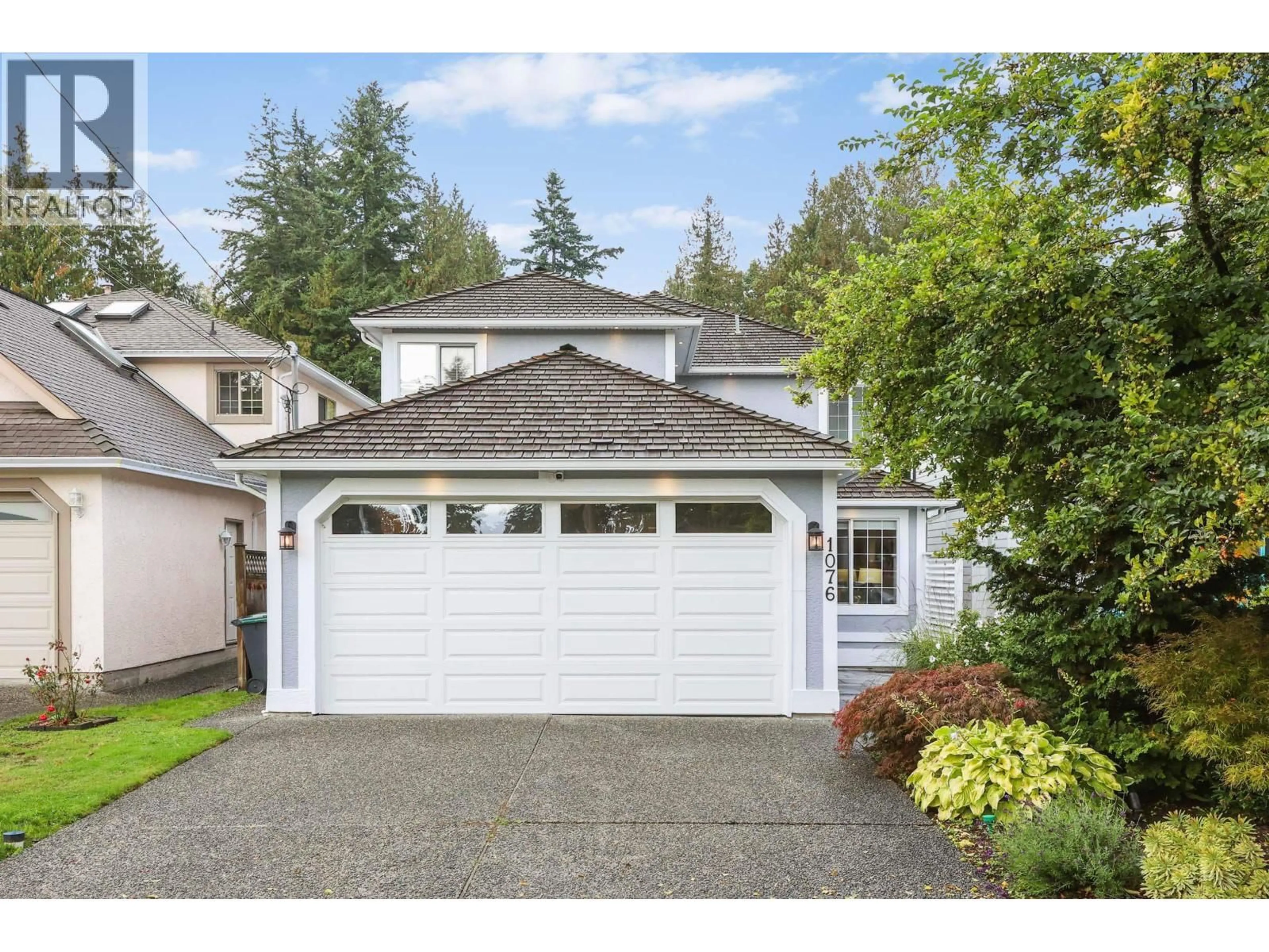 Home with vinyl exterior material, street for 1076 CLEMENTS AVENUE, North Vancouver British Columbia V7R2L4