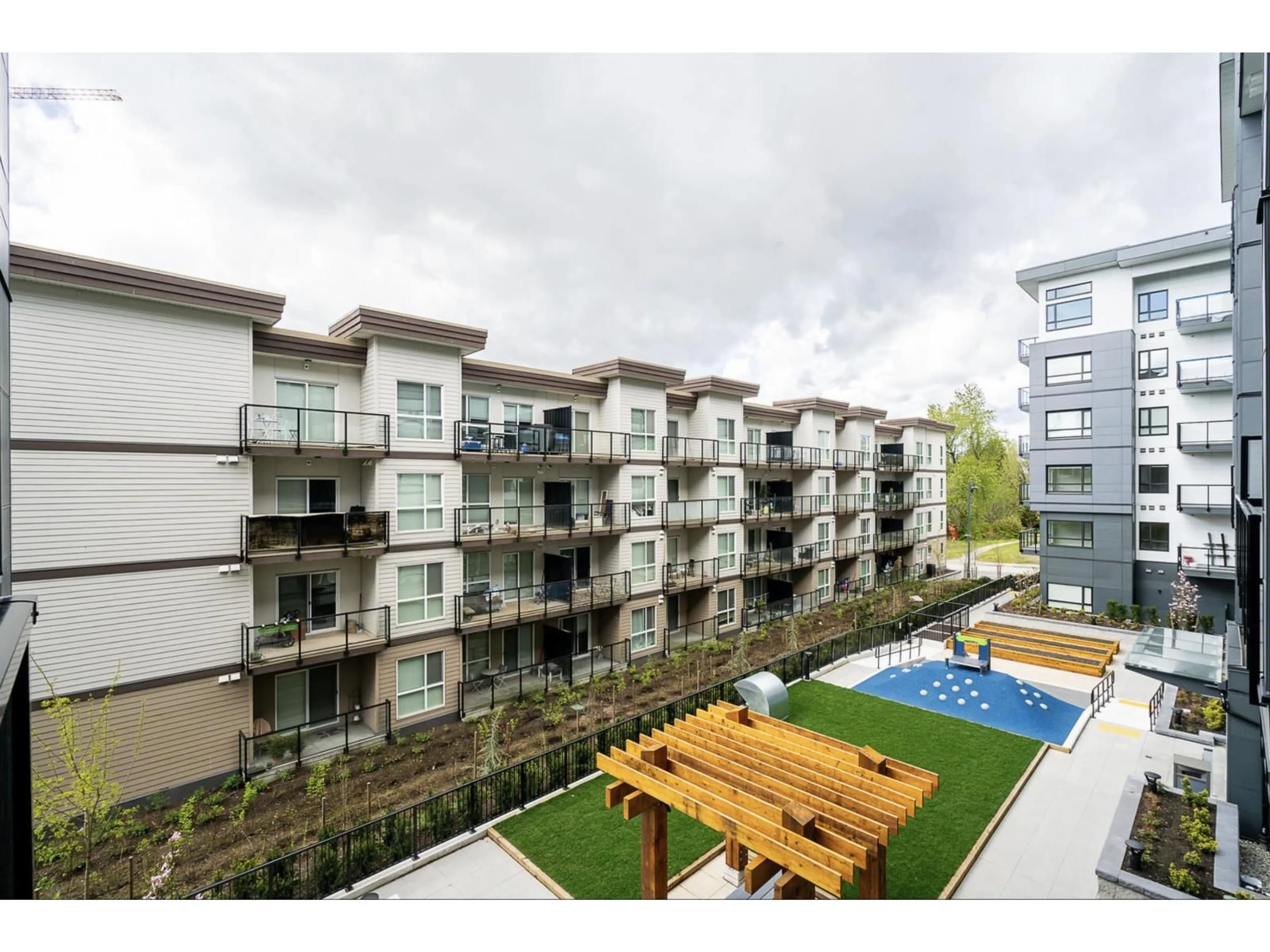 A pic from outside/outdoor area/front of a property/back of a property/a pic from drone, city buildings view from balcony for 203 - 10777 138, Surrey British Columbia V3T0T5