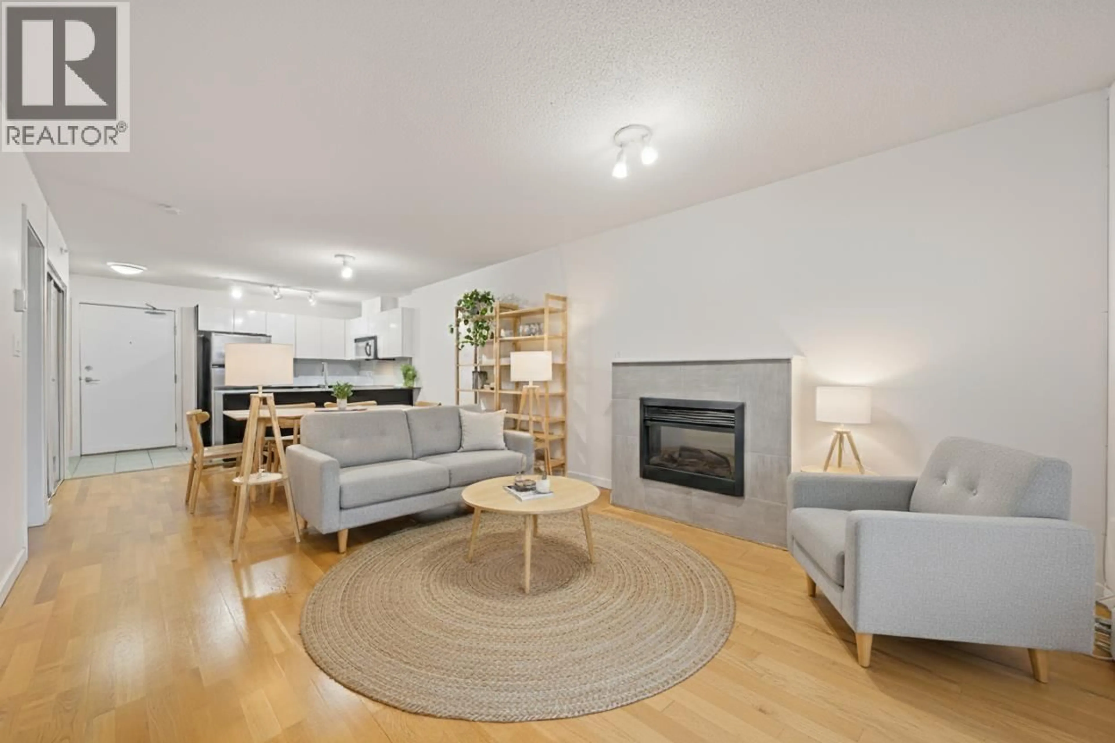 Living room with furniture, wood/laminate floor for 1105 - 4178 DAWSON STREET, Burnaby British Columbia V5C0A1