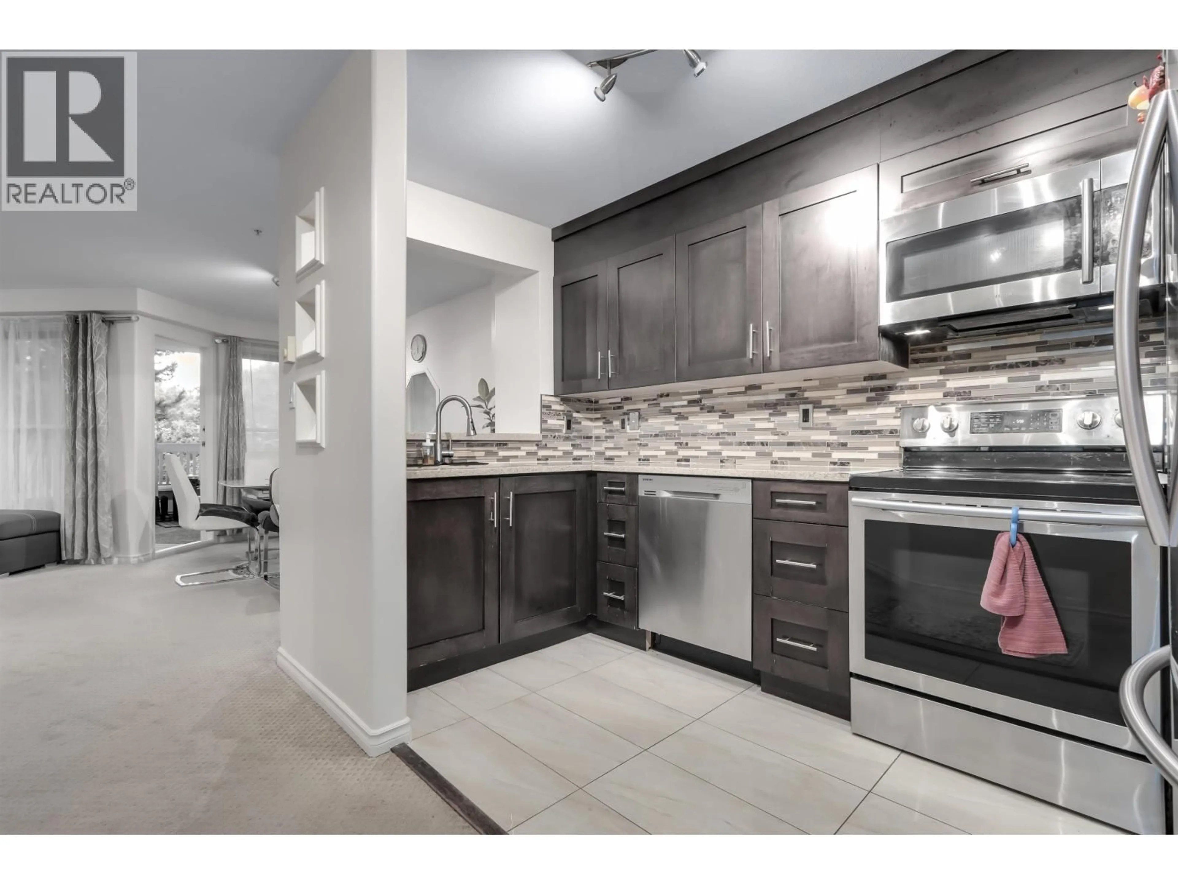 Open concept kitchen, ceramic/tile floor for 205 - 8880 JONES ROAD, Richmond British Columbia V6Y3Z1