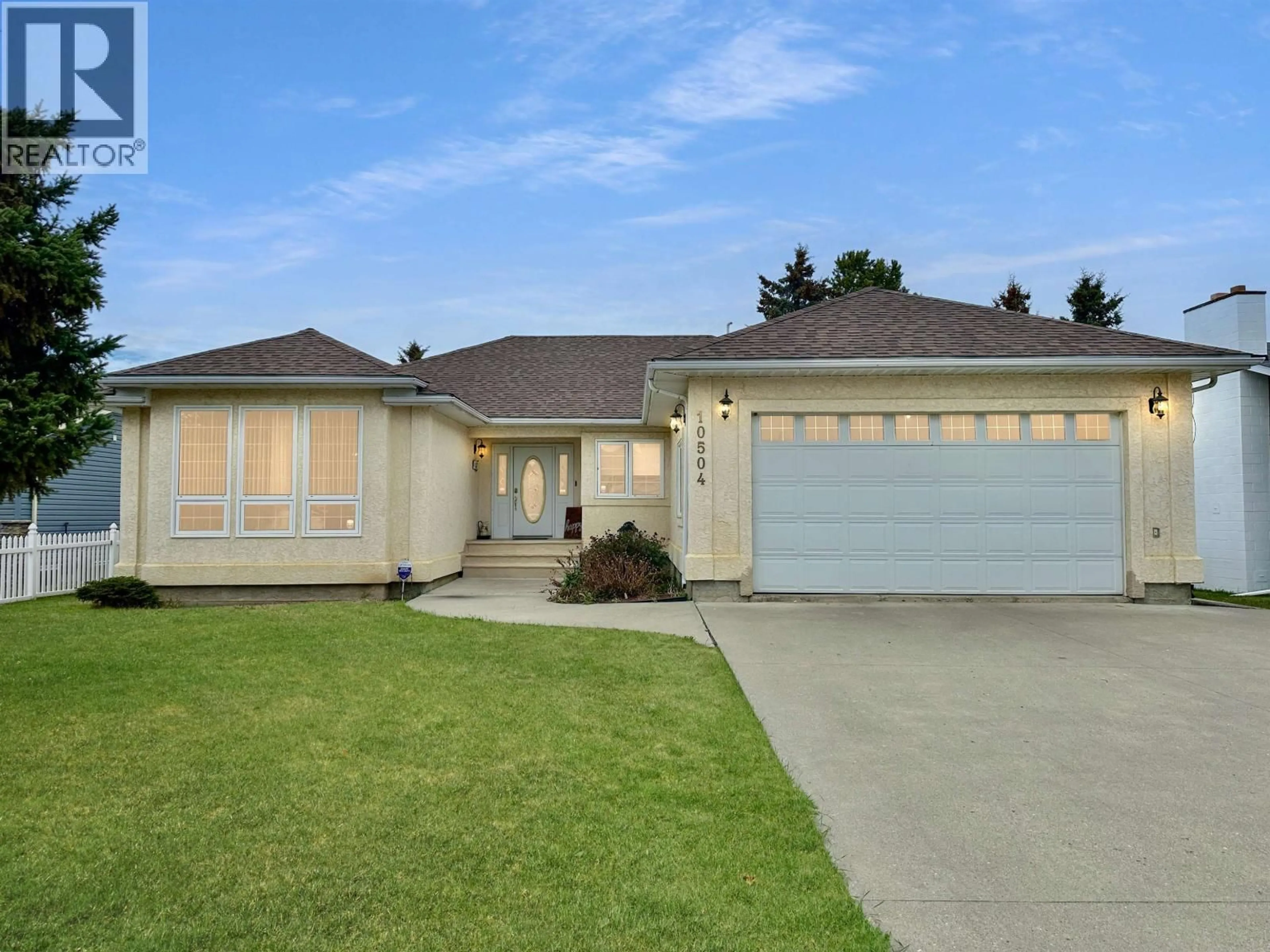Home with vinyl exterior material, street for 10504 114 AVENUE, Fort St. John British Columbia V1J6K9