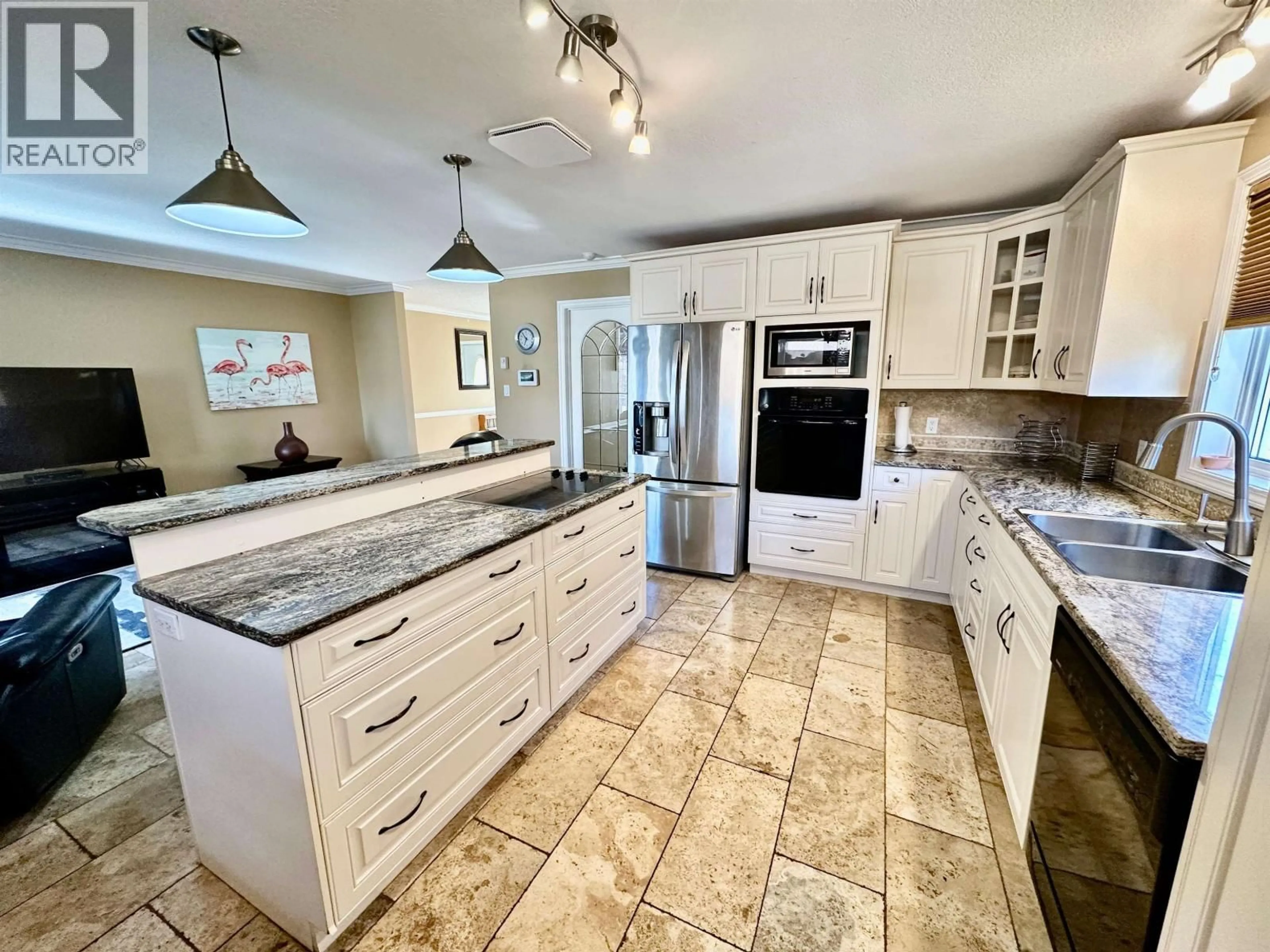 Open concept kitchen, ceramic/tile floor for 10504 114 AVENUE, Fort St. John British Columbia V1J6K9