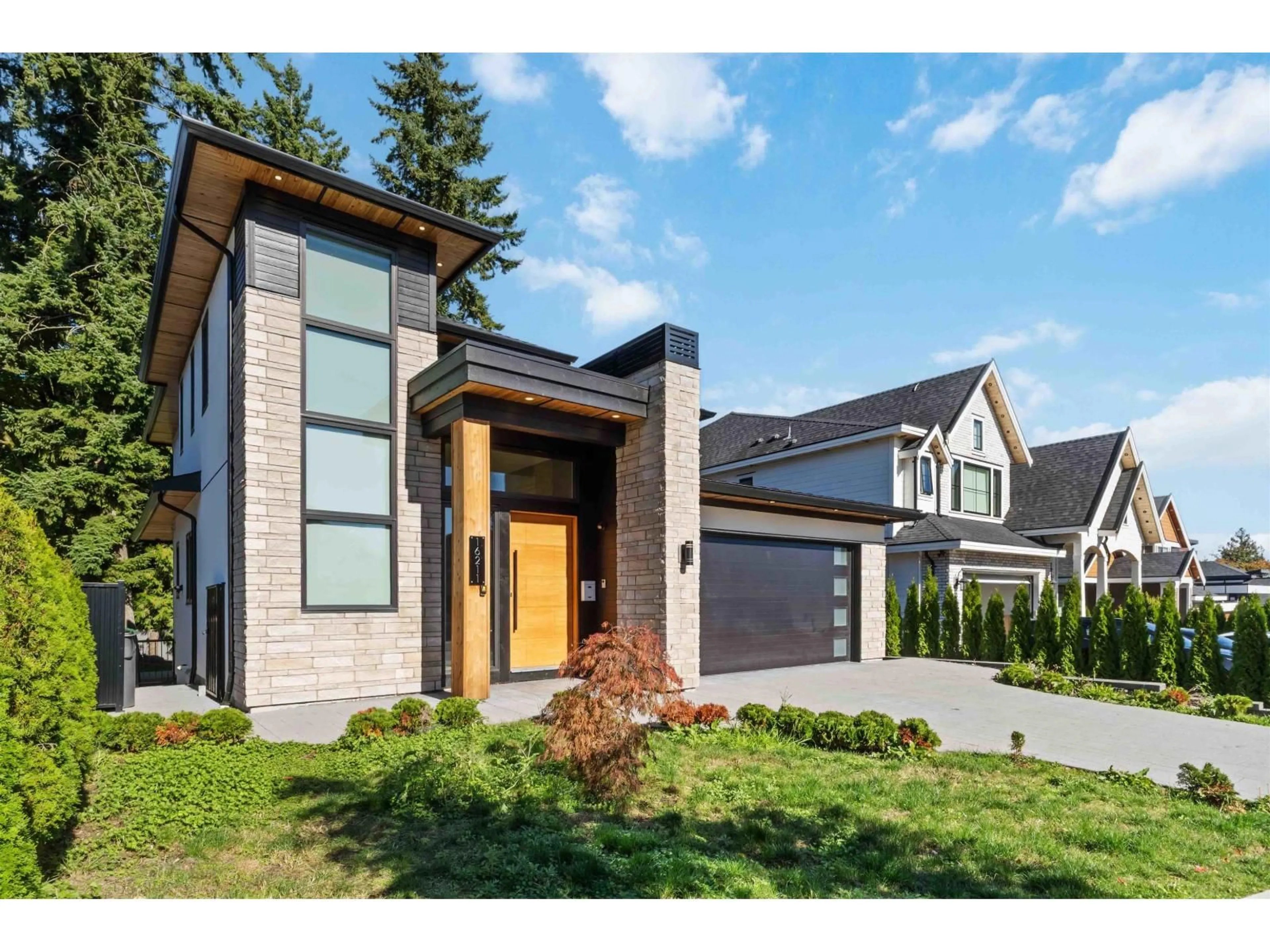 Home with brick exterior material, street for 16211 96B, Surrey British Columbia V4N5X2
