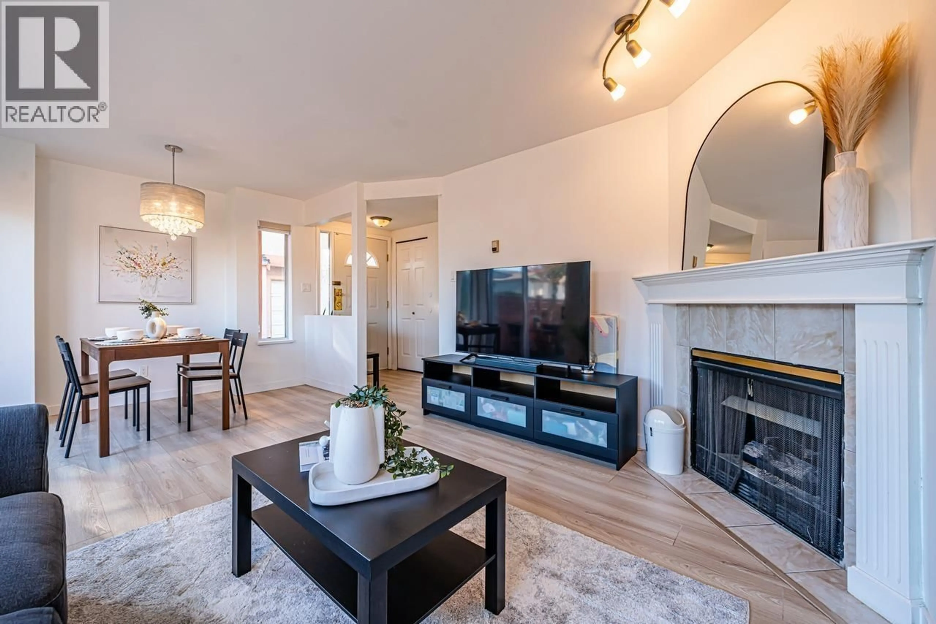 Living room with furniture, wood/laminate floor for 1 - 7231 MOFFATT ROAD, Richmond British Columbia V6Y1X9