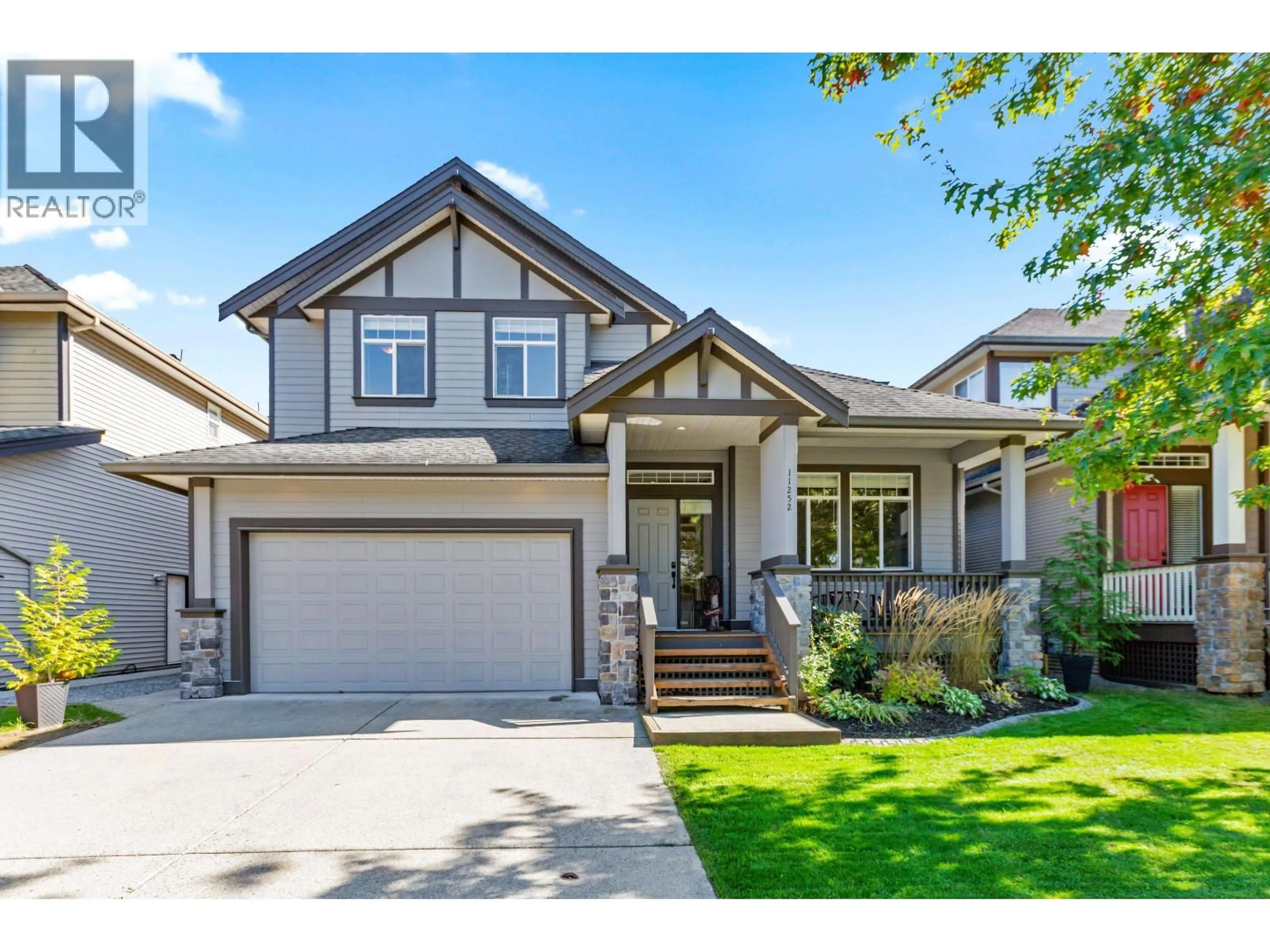 Home with vinyl exterior material, street for 11252 SOUTHGATE ROAD, Pitt Meadows British Columbia V3Y2W3