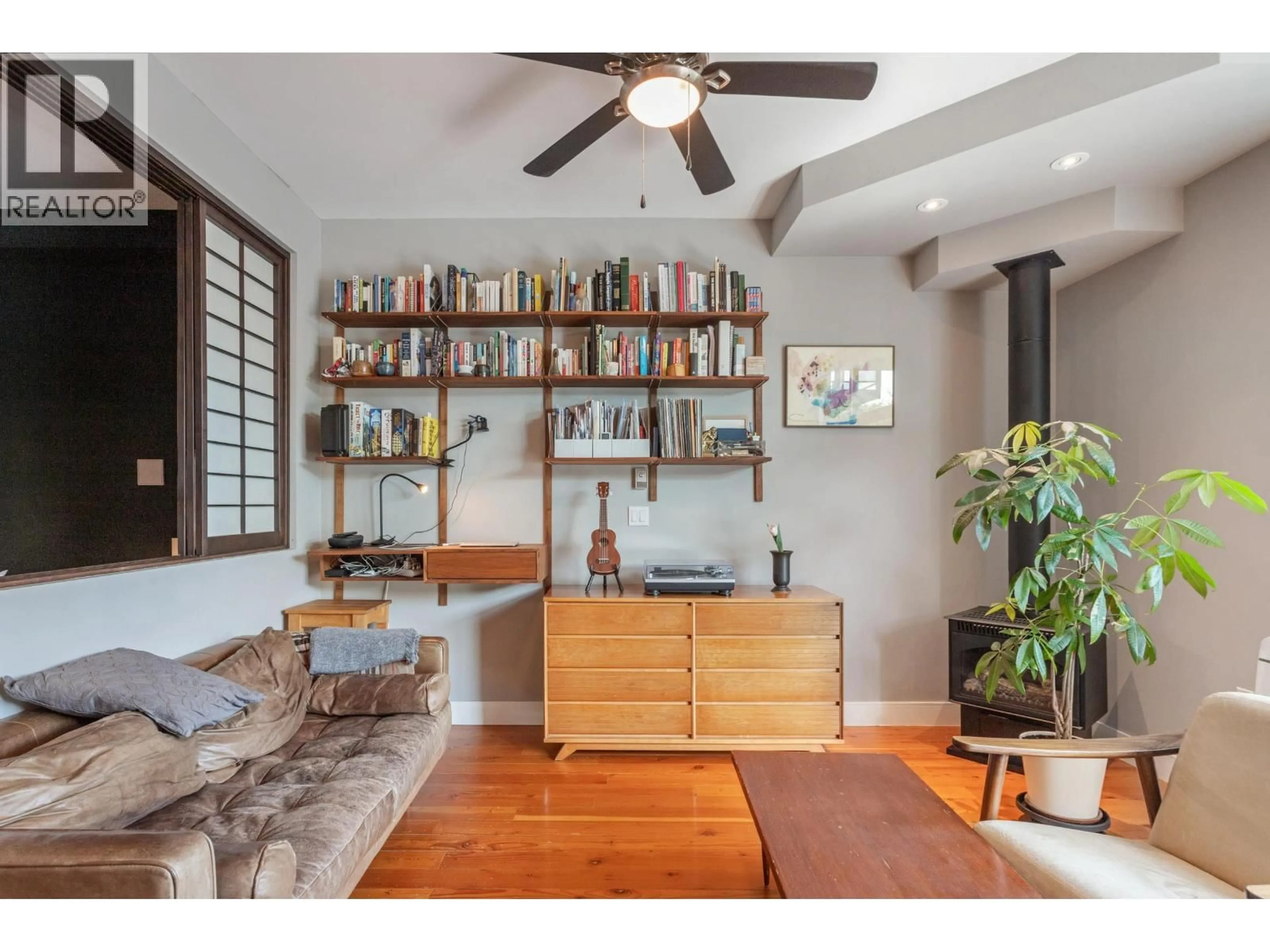 Living room with furniture, wood/laminate floor for 213 - 8988 HUDSON STREET, Vancouver British Columbia V6P6Z1