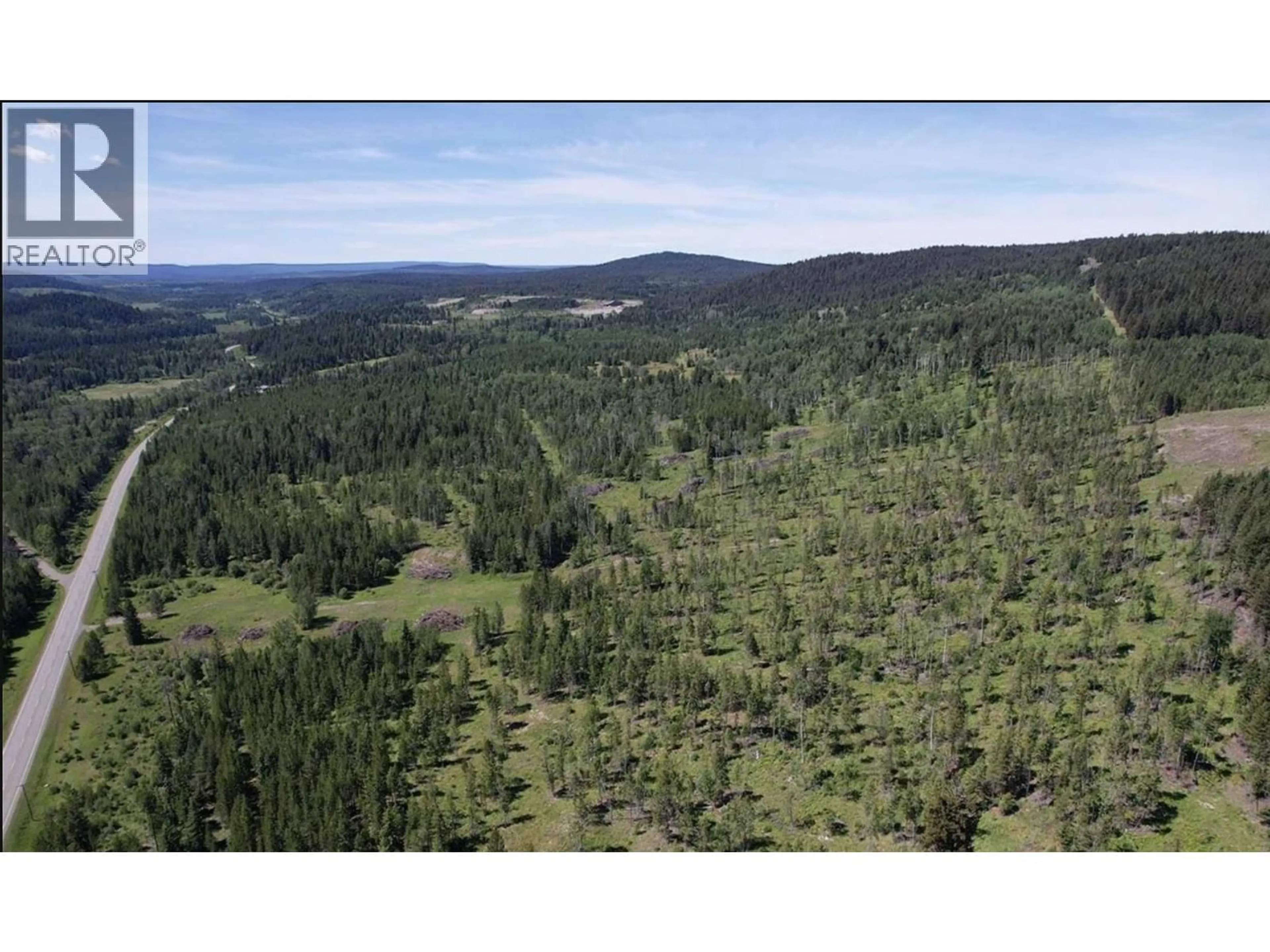 A pic from outside/outdoor area/front of a property/back of a property/a pic from drone, forest/trees view for 4656 CANIM HENDRIX LAKE ROAD, Forest Grove British Columbia V0K1M0