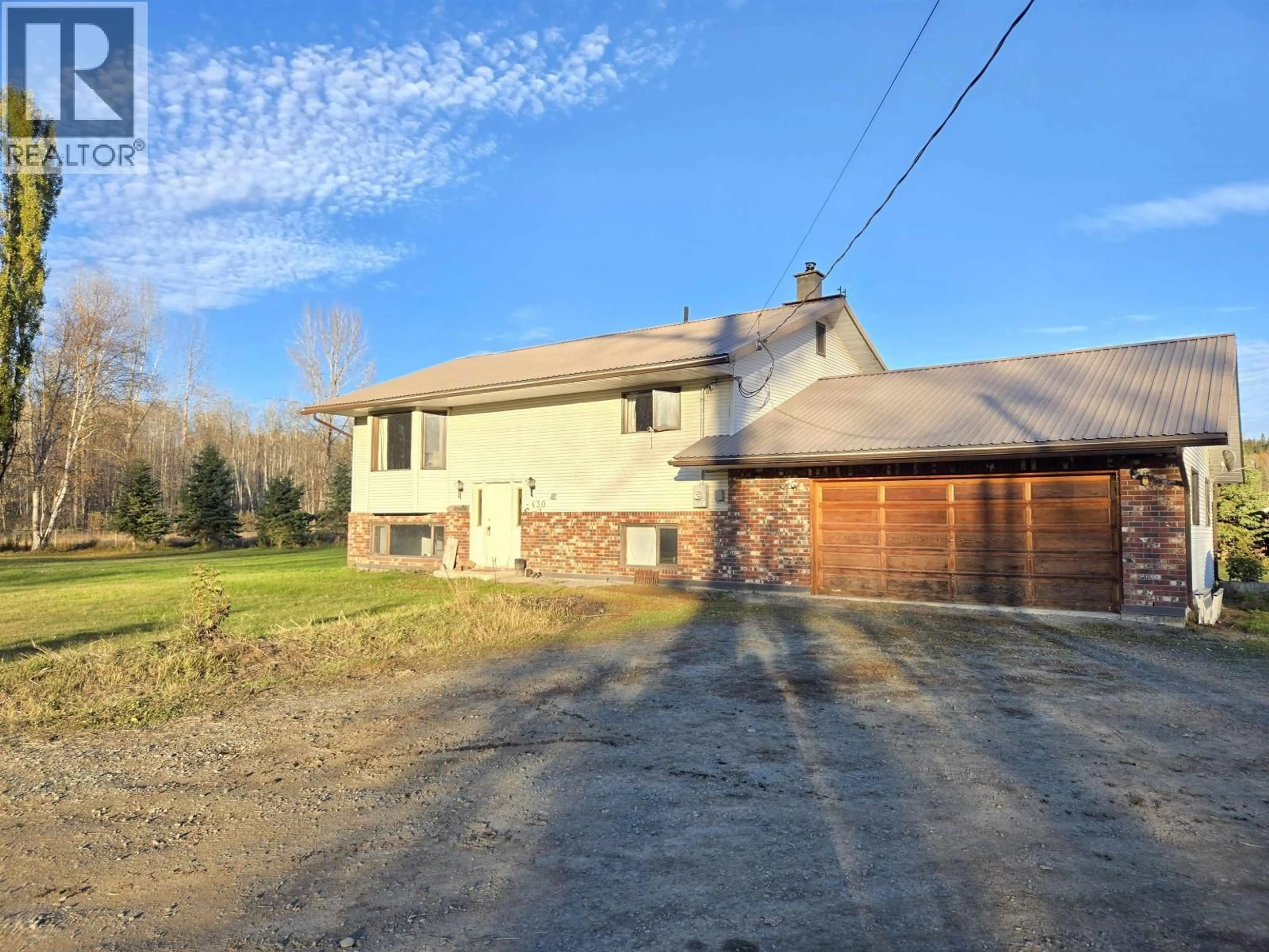A pic from outside/outdoor area/front of a property/back of a property/a pic from drone, street for 430 ARNETT ROAD, Willow River British Columbia V0K1S1
