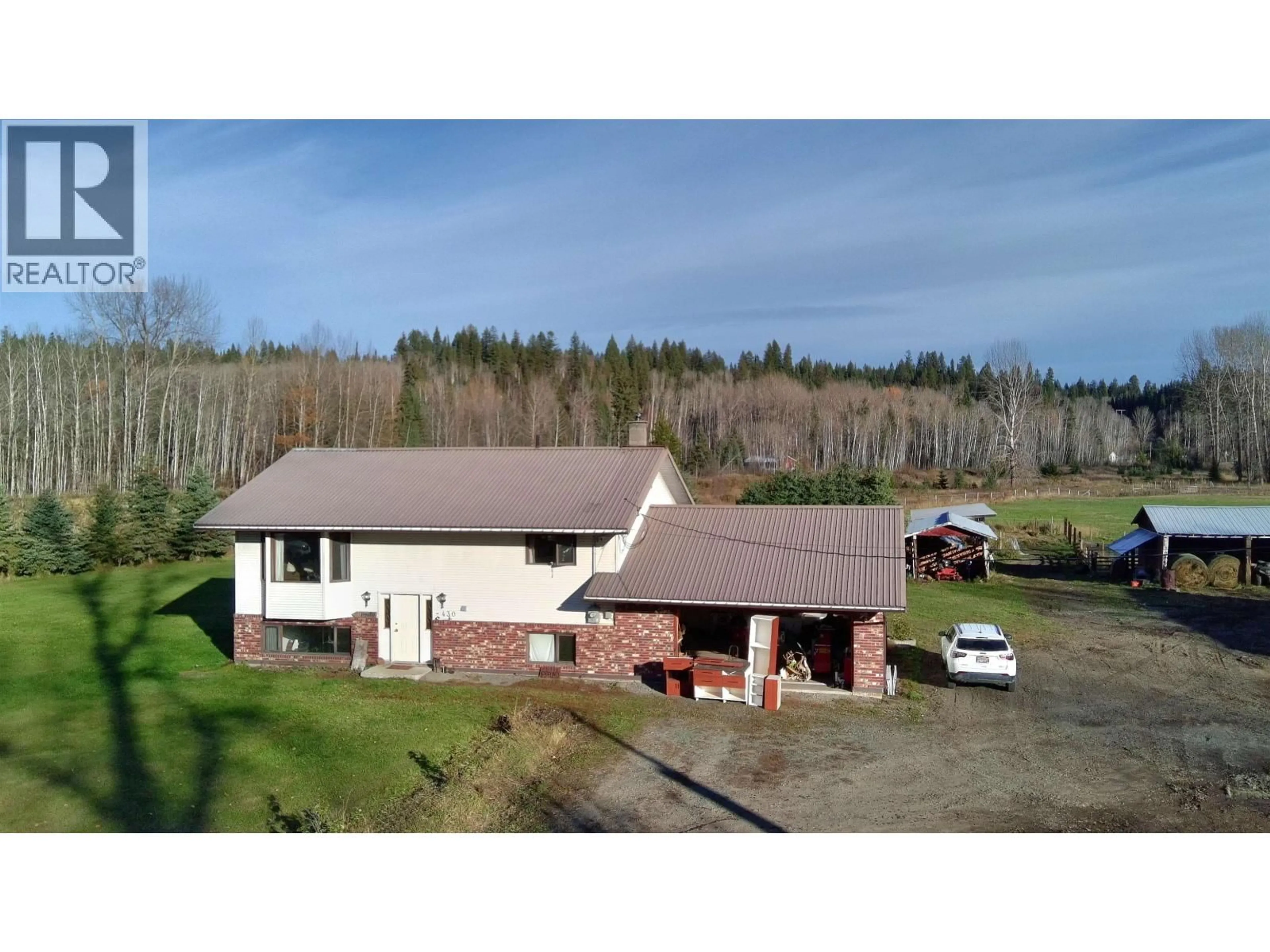 A pic from outside/outdoor area/front of a property/back of a property/a pic from drone, building for 430 ARNETT ROAD, Willow River British Columbia V0K1S1