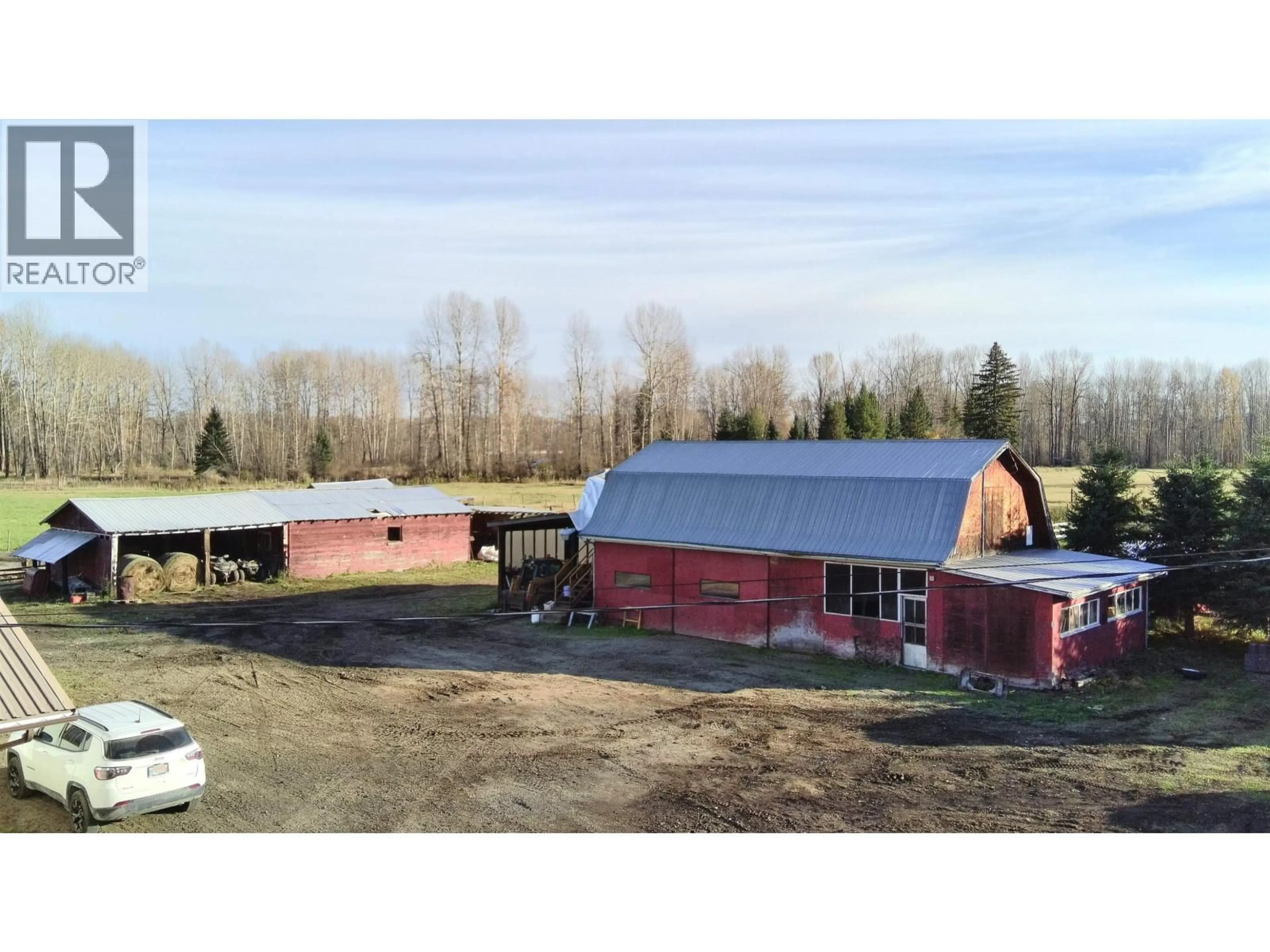 A pic from outside/outdoor area/front of a property/back of a property/a pic from drone, building for 430 ARNETT ROAD, Willow River British Columbia V0K1S1