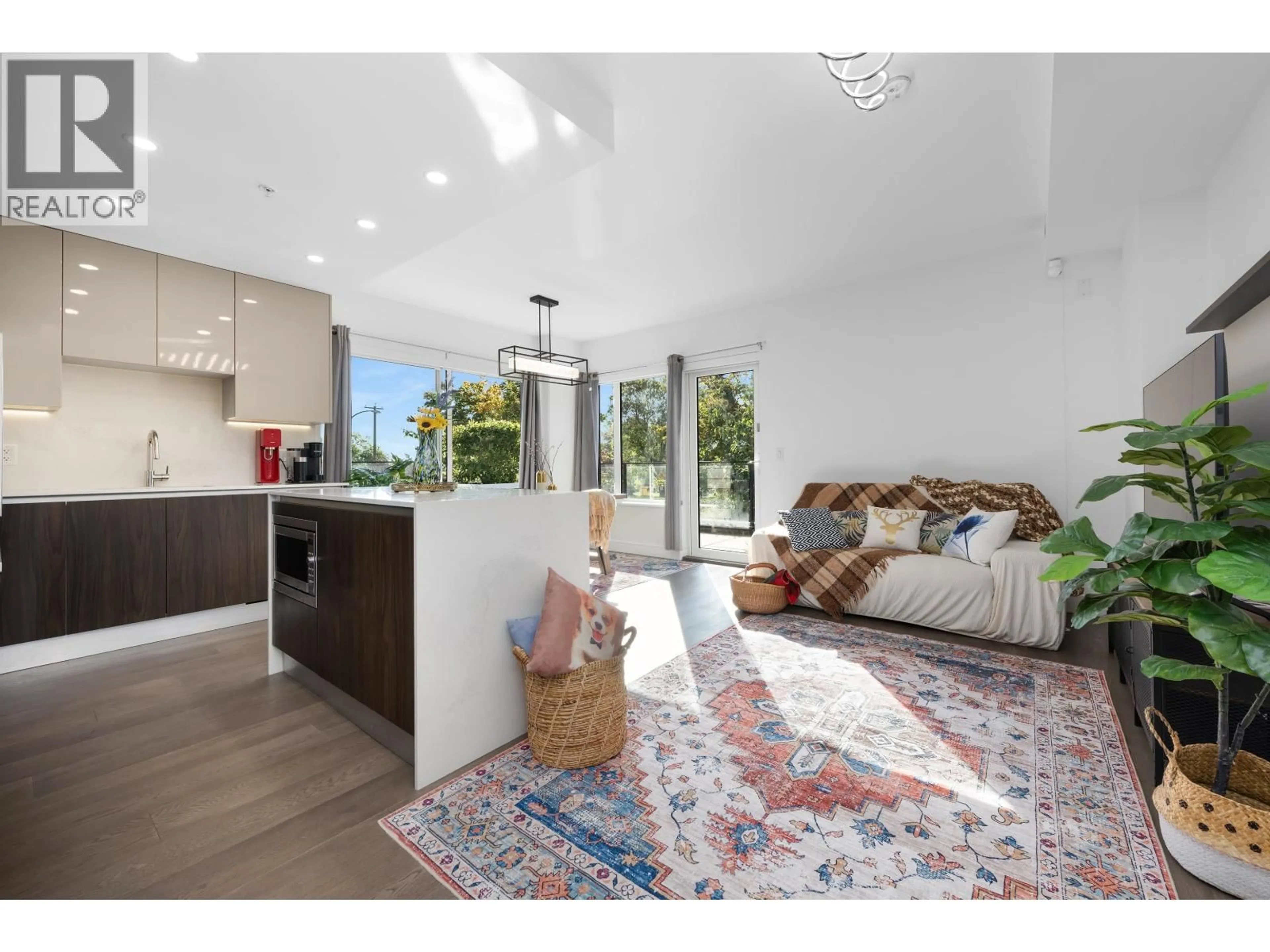 Open concept kitchen, unknown for 106 - 477 59TH AVENUE, Vancouver British Columbia V5X1X4