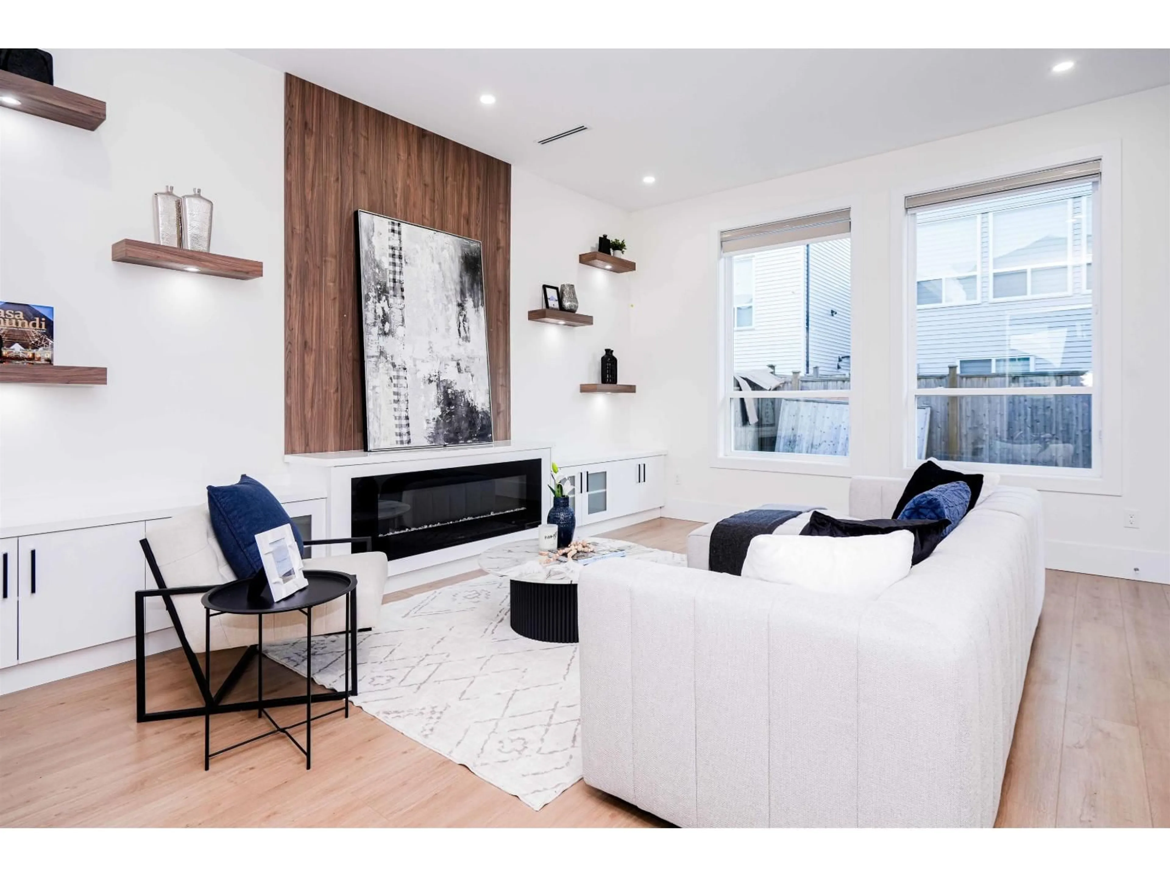 Living room with furniture, wood/laminate floor for 14742 62A, Surrey British Columbia V3S2W9