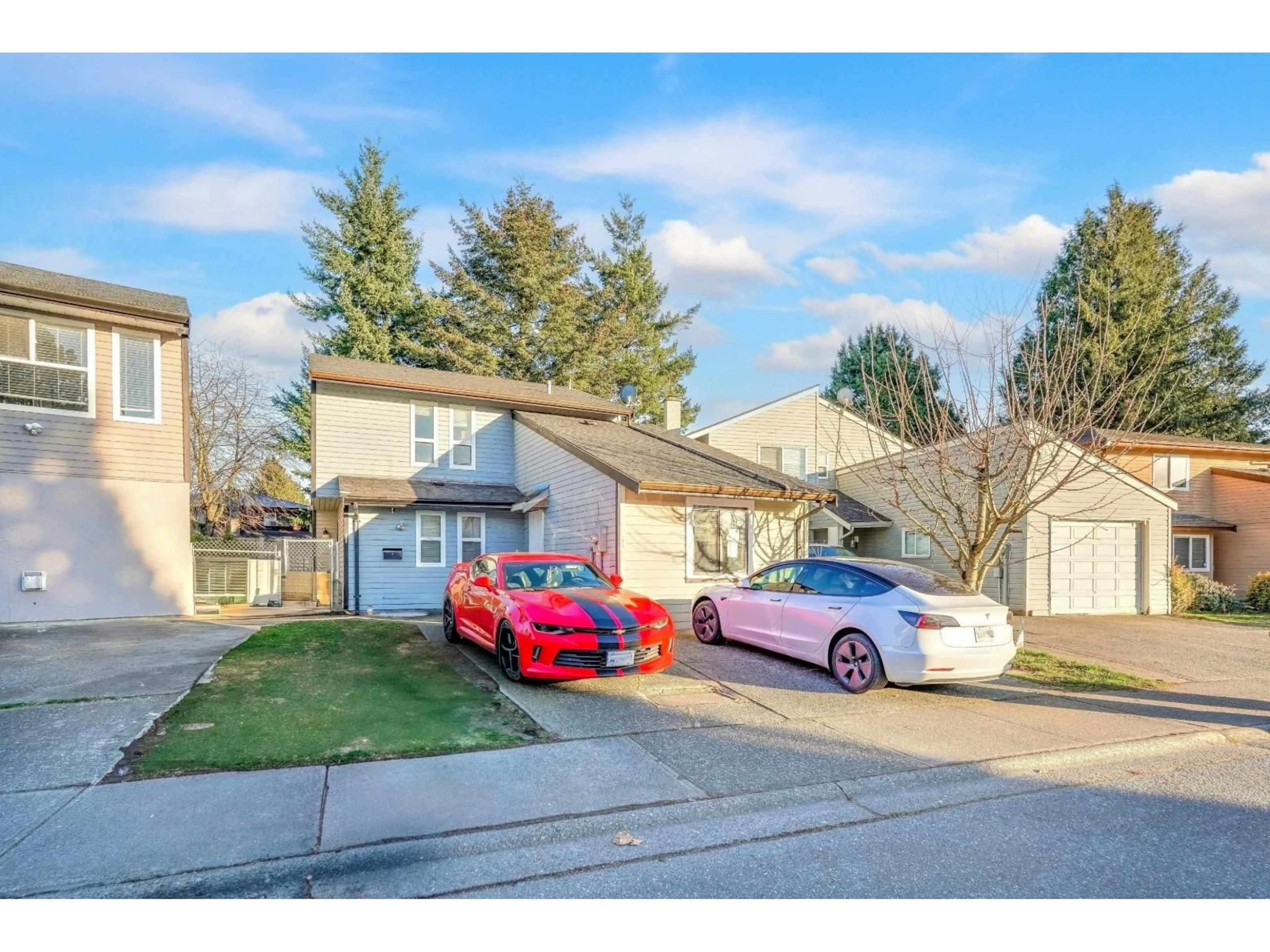 A pic from outside/outdoor area/front of a property/back of a property/a pic from drone, street for 7368 PARKWOOD, Surrey British Columbia V3W7G6