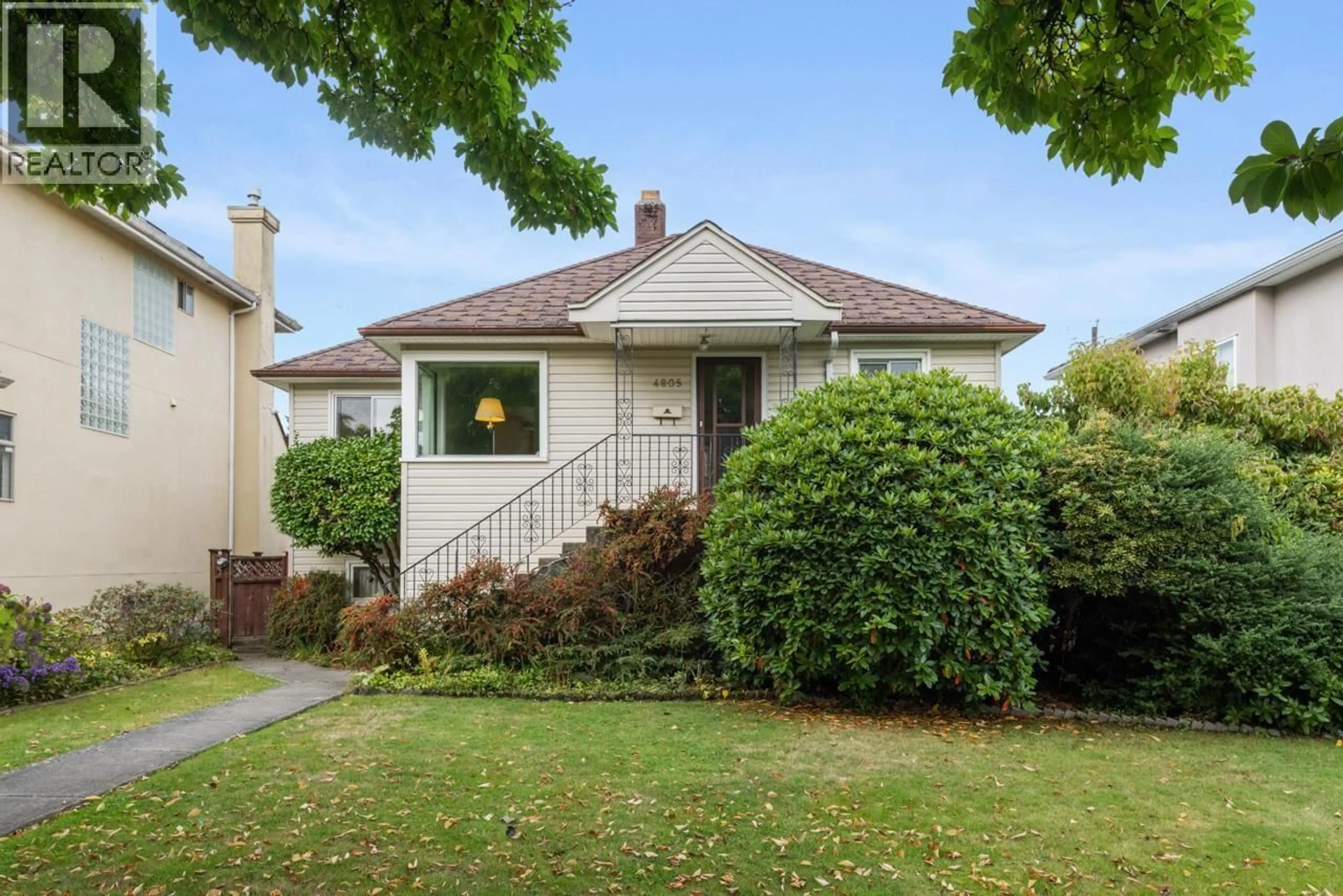 Home with vinyl exterior material, street for 4805 INVERNESS STREET, Vancouver British Columbia V5V4X5