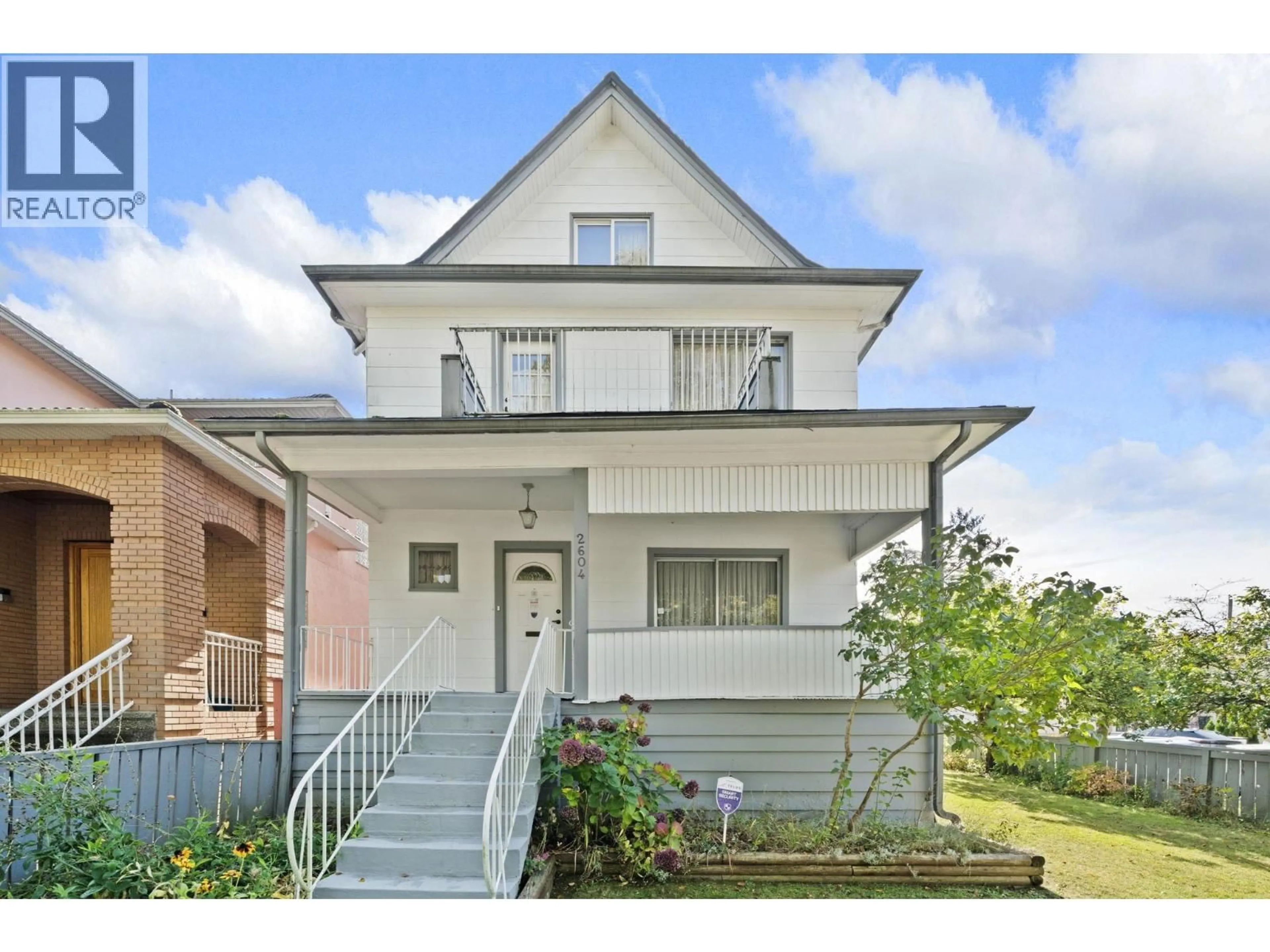 Home with brick exterior material, street for 2604 19TH AVENUE, Vancouver British Columbia V5M2S4