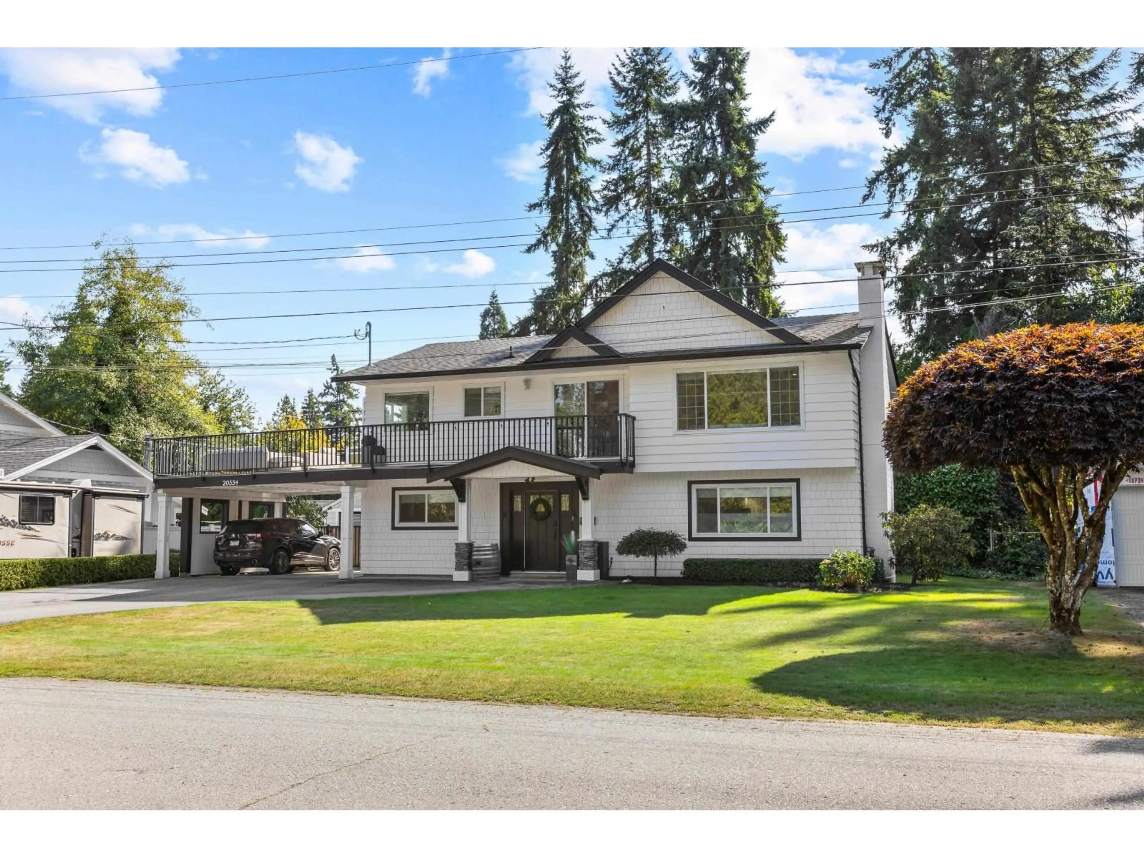 Home with vinyl exterior material, street for 20334 38A, Langley British Columbia V3A5M3