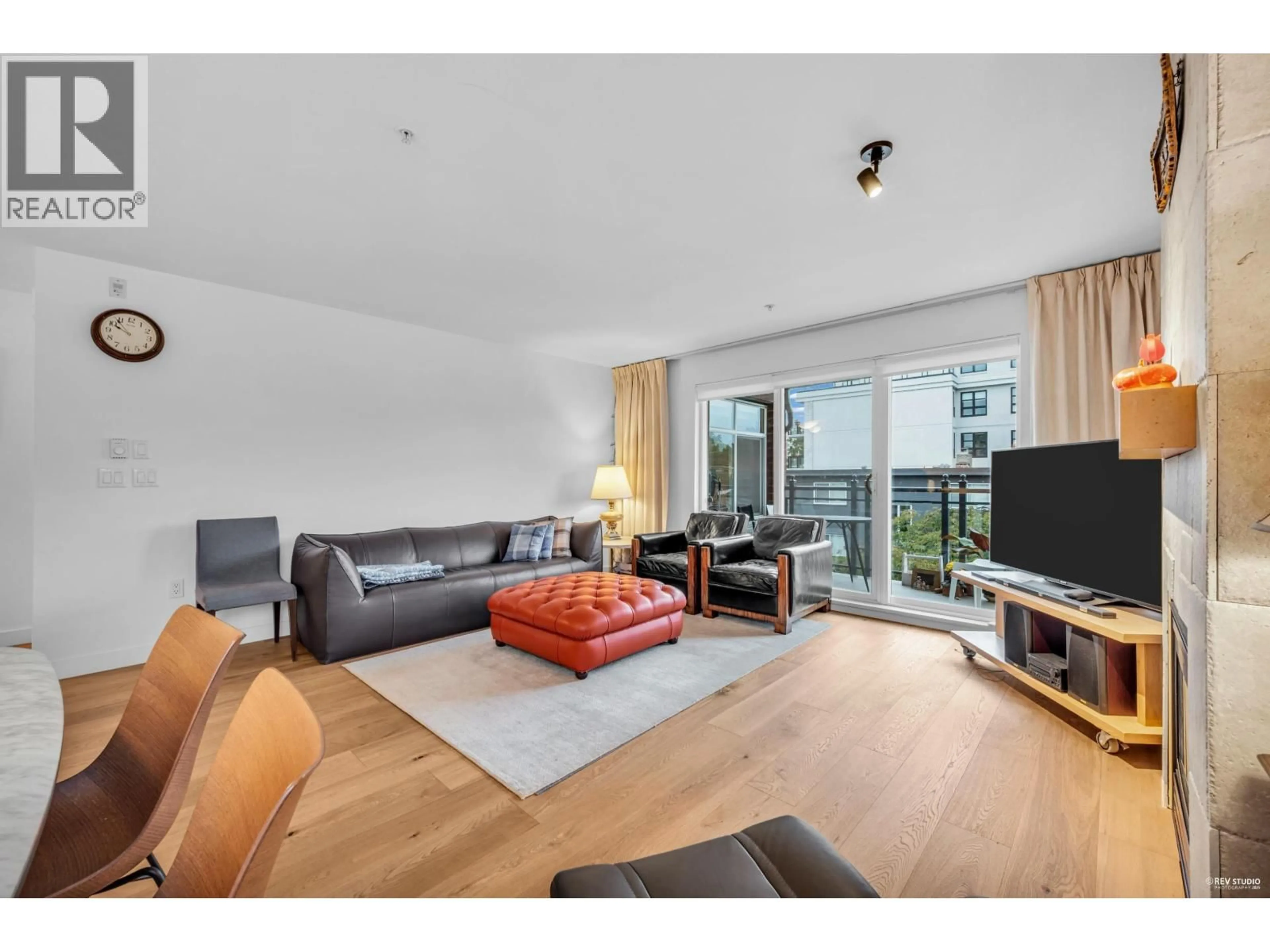 Living room with furniture, wood/laminate floor for 301 - 2096 W 46TH AVENUE, Vancouver British Columbia V6M2K9