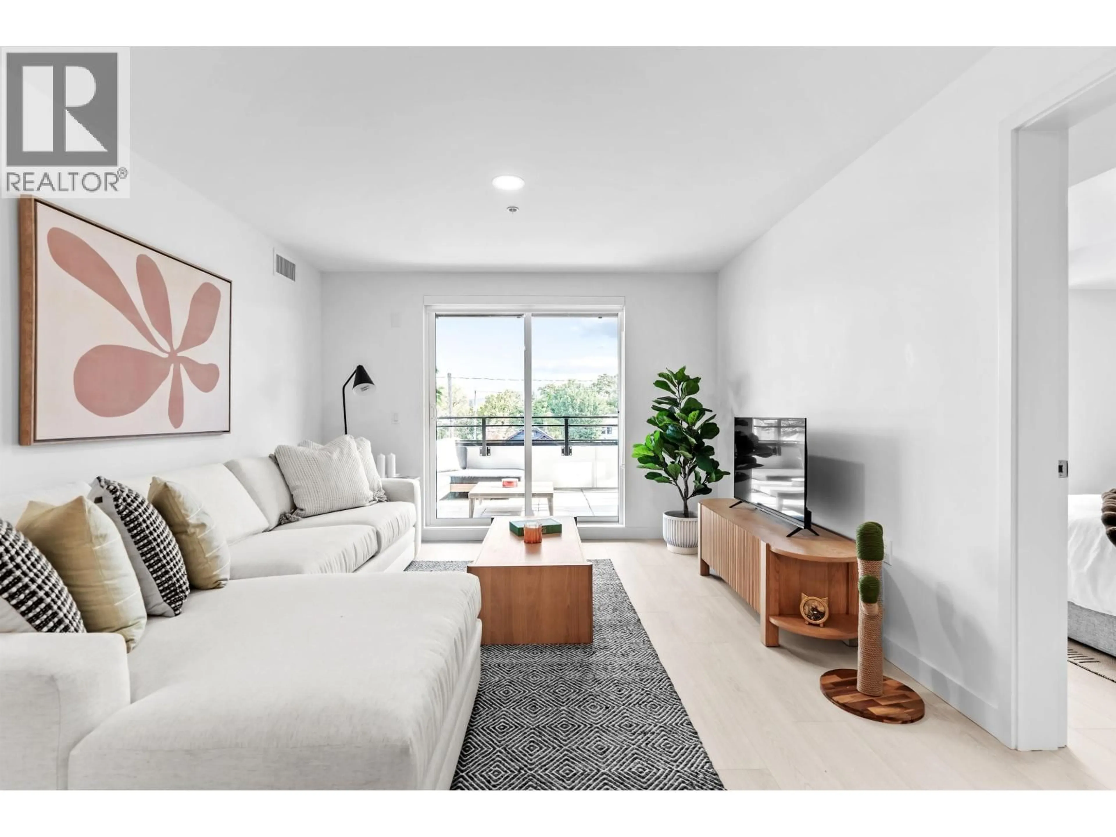 Living room with furniture, unknown for 204 - 2419 GRANT STREET, Vancouver British Columbia V5K3G5