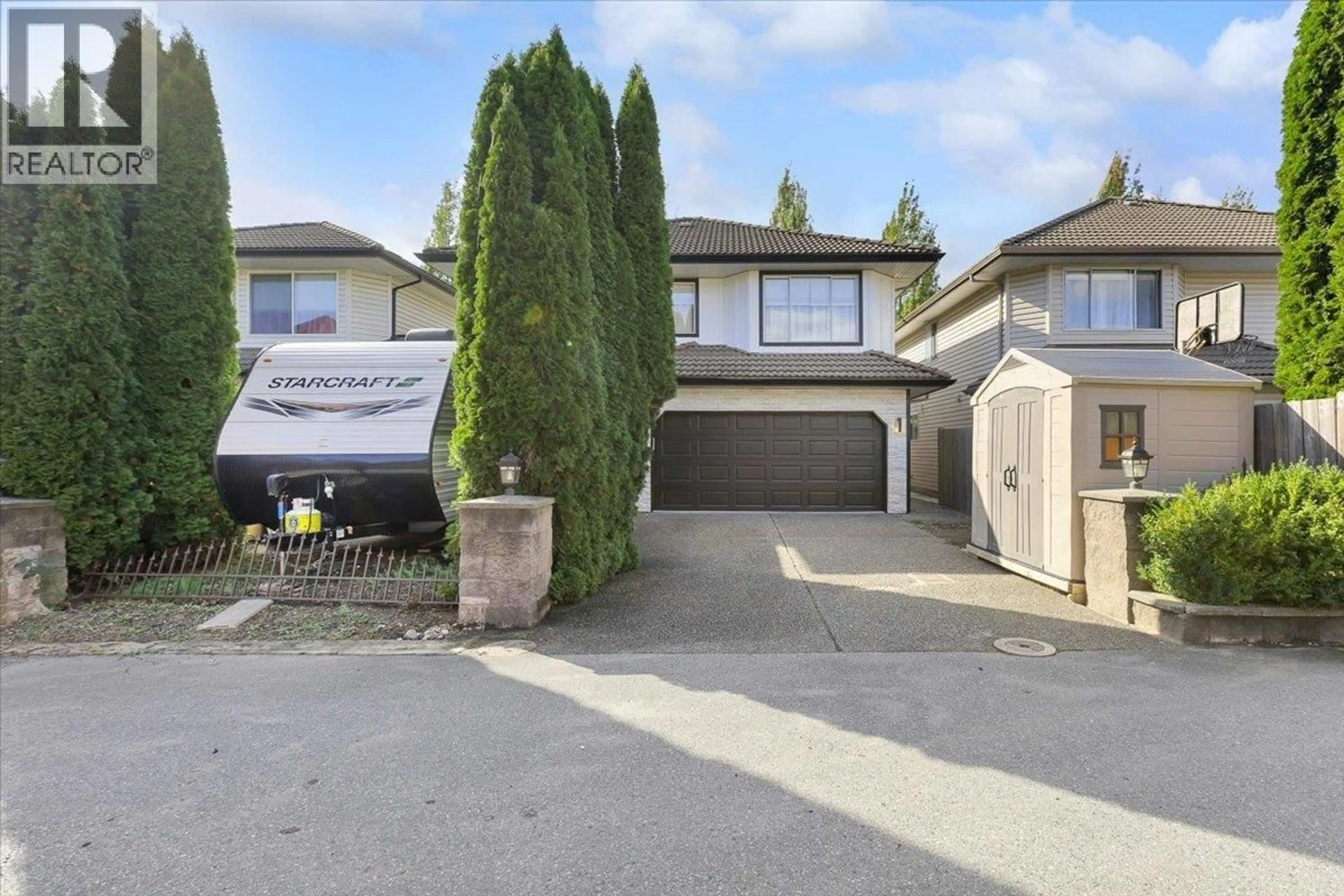 A pic from outside/outdoor area/front of a property/back of a property/a pic from drone, street for 2470 COAST MERIDIAN ROAD, Port Coquitlam British Columbia V3B3M3