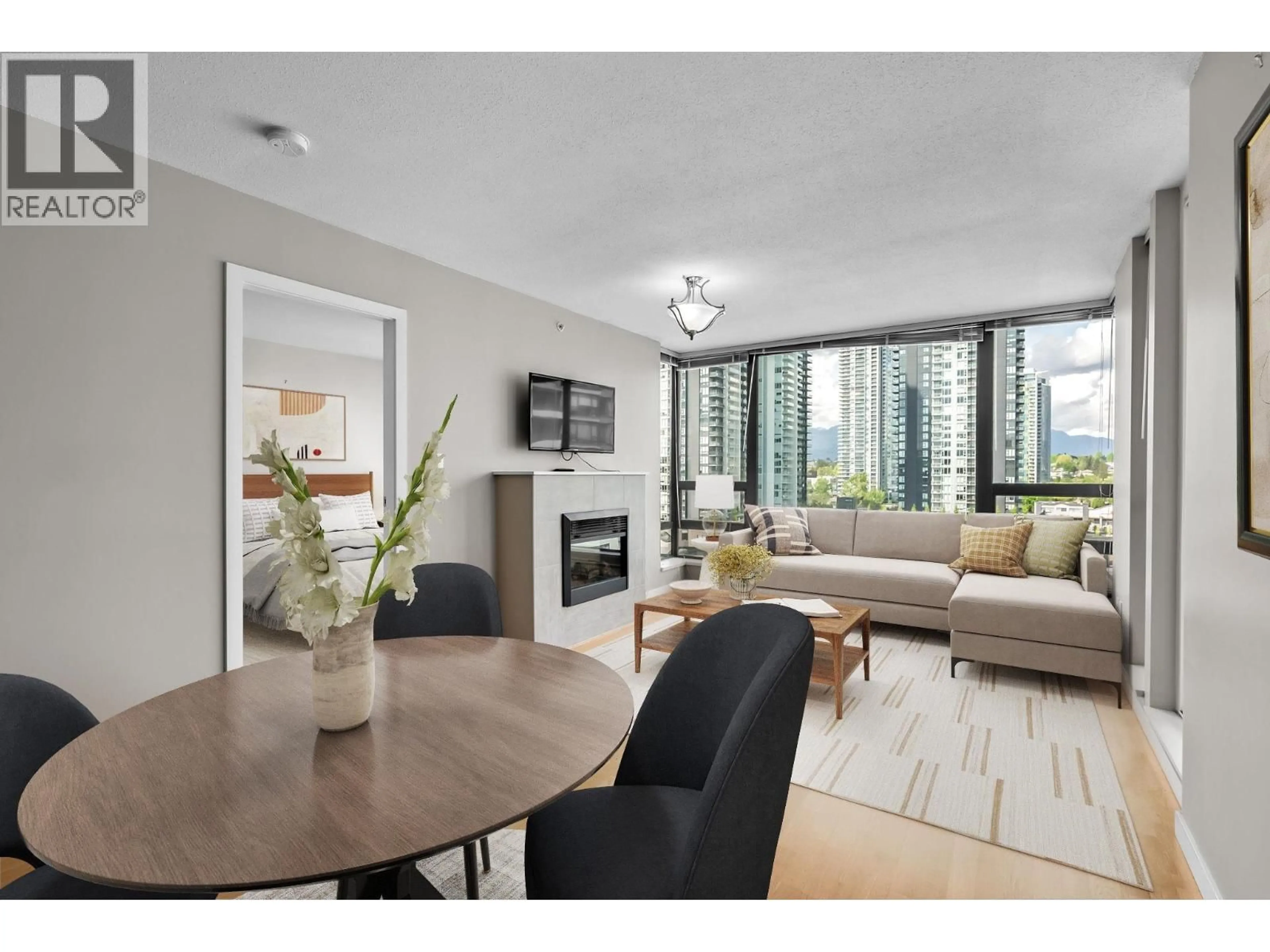 Living room with furniture, wood/laminate floor for 1608 - 4178 DAWSON STREET, Burnaby British Columbia V5C0A1