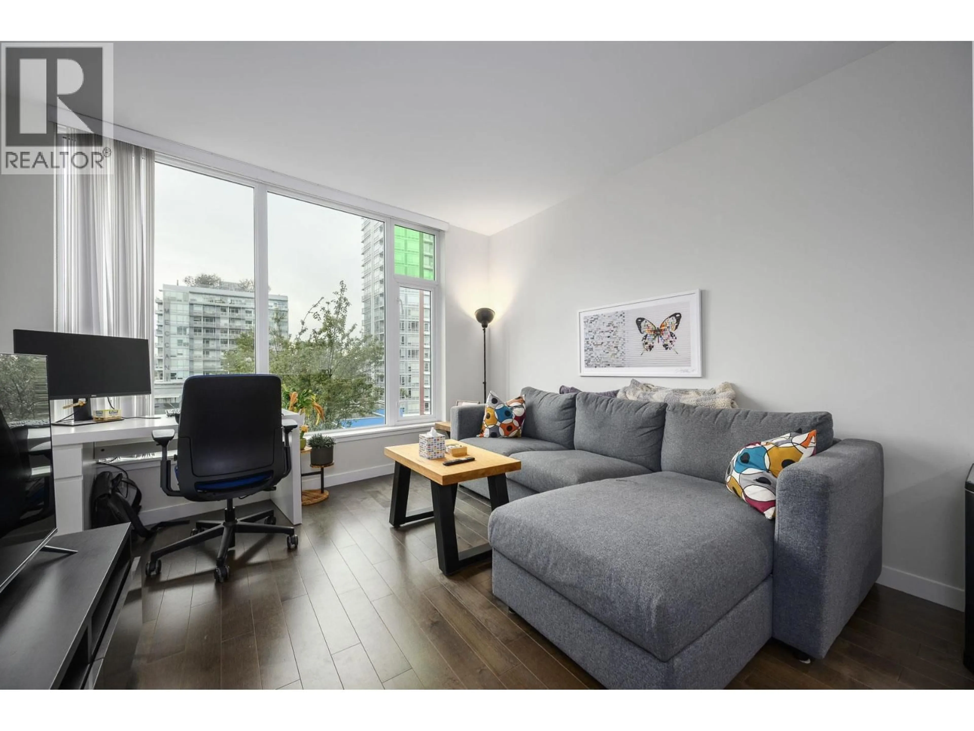 Living room with furniture, wood/laminate floor for 708 - 1708 ONTARIO STREET, Vancouver British Columbia V5T0J7