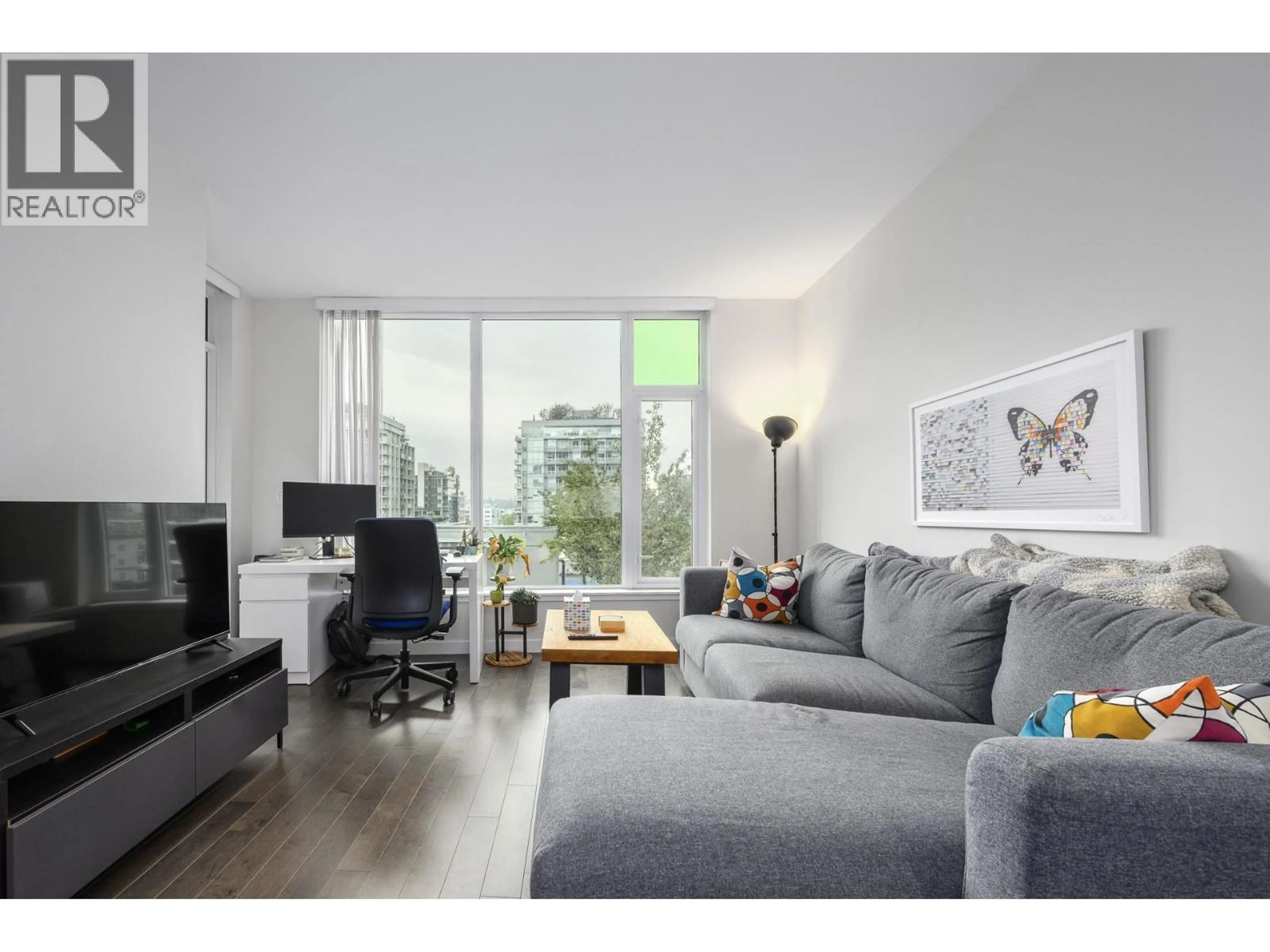 Living room with furniture, wood/laminate floor for 708 - 1708 ONTARIO STREET, Vancouver British Columbia V5T0J7