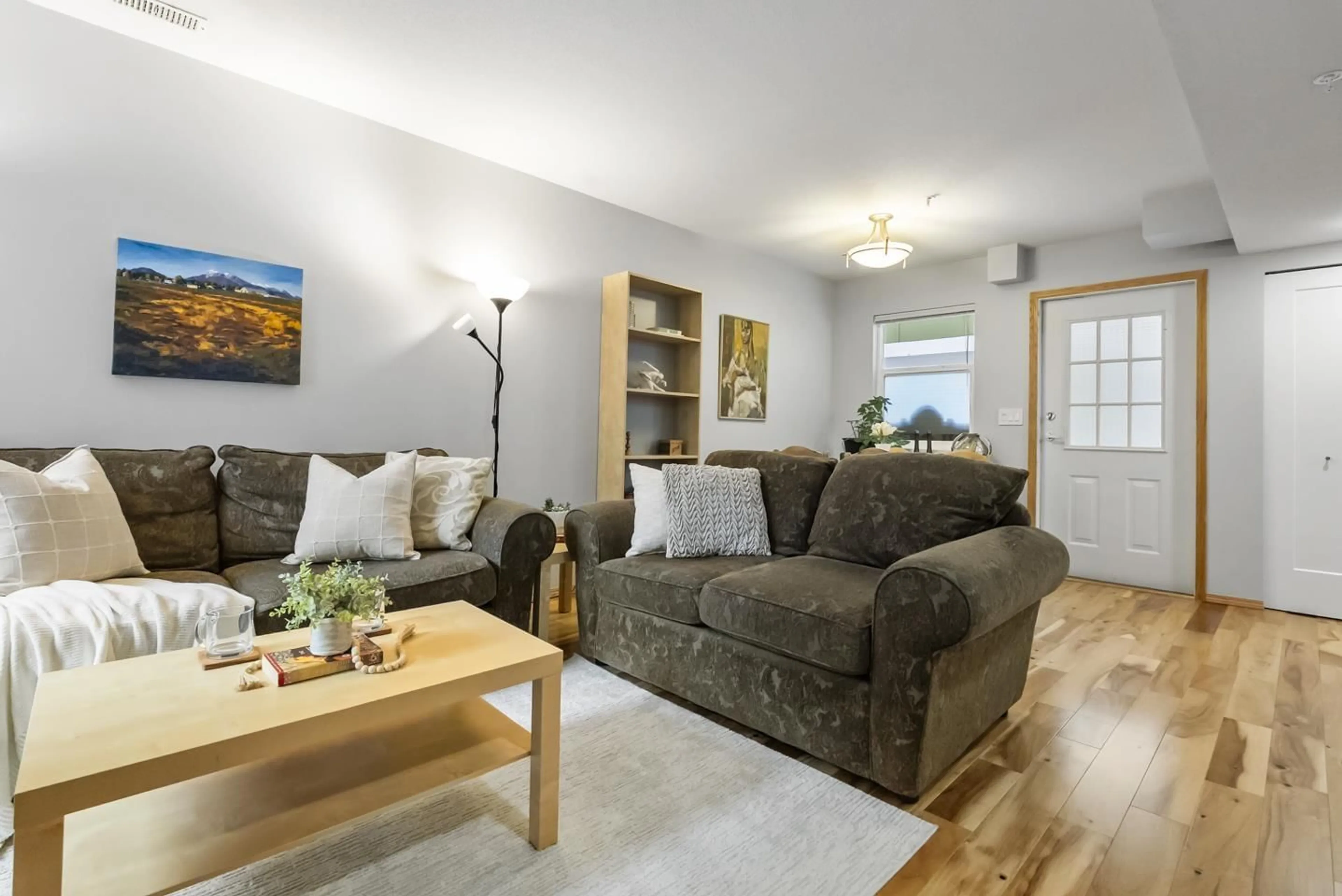 Living room with furniture, wood/laminate floor for 22 - 20543 96, Langley British Columbia V1M3W3