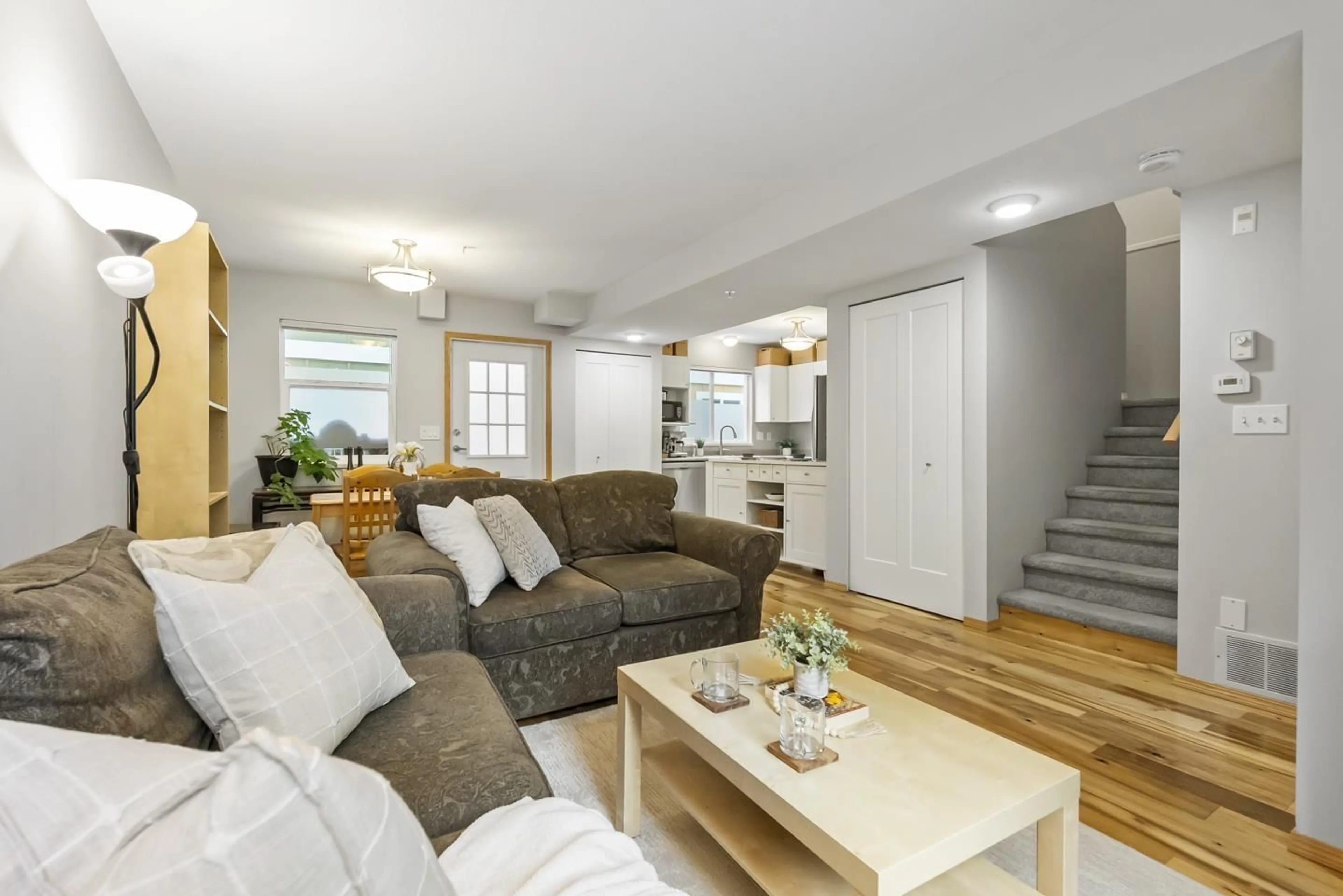 Living room with furniture, wood/laminate floor for 22 - 20543 96, Langley British Columbia V1M3W3
